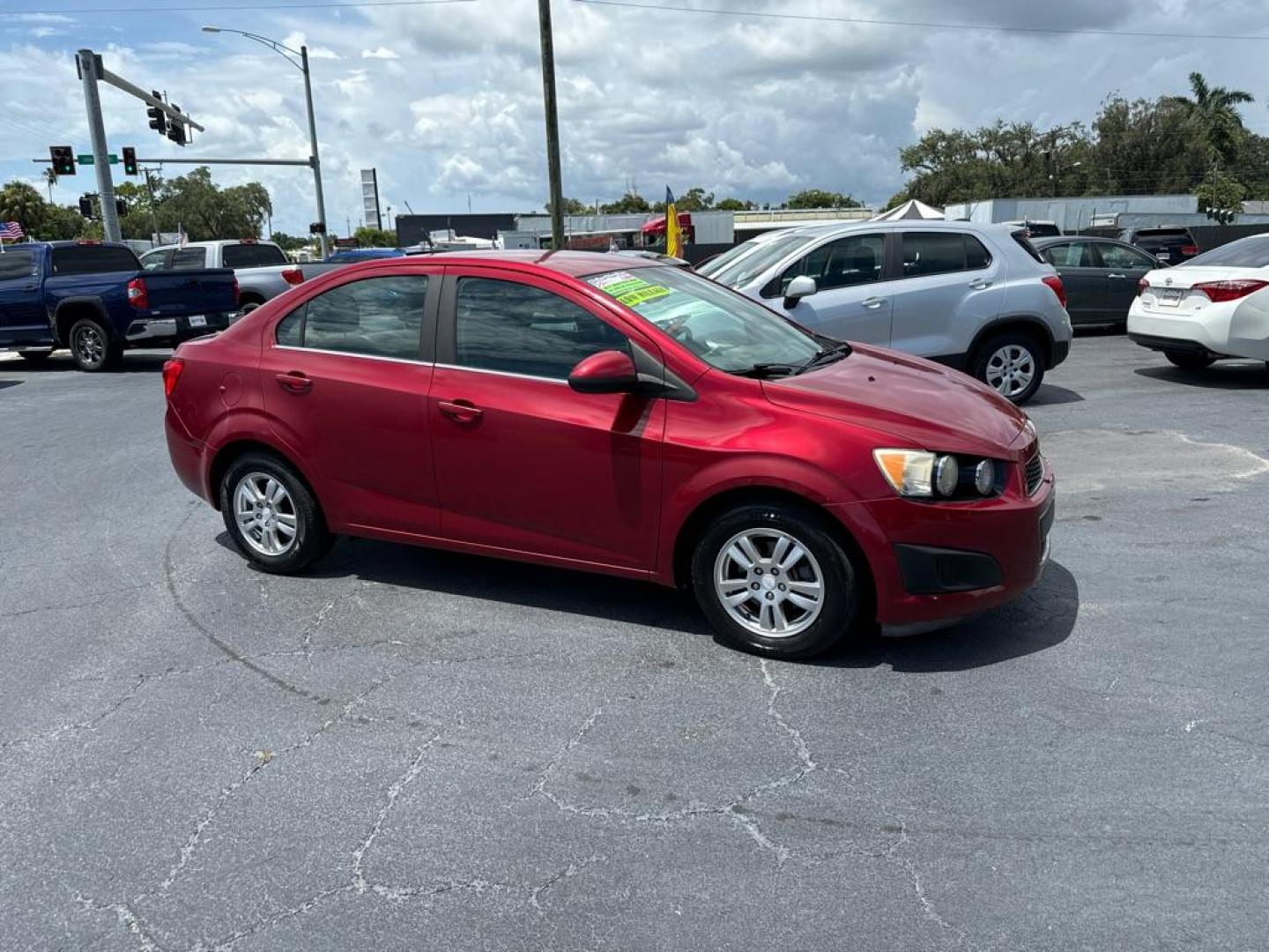 2013 RED CHEVROLET SONIC LT (1G1JC5SH2D4) with an 1.8L engine, Automatic transmission, located at 2929 9th St. West, Bradenton, 34205, (941) 242-2810, 27.473591, -82.570679 - Photo#0