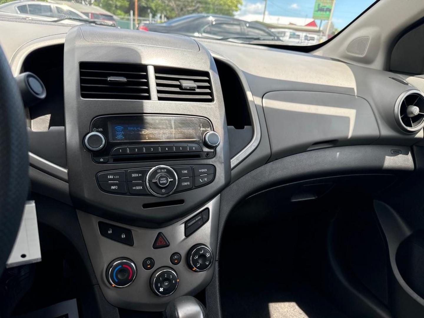 2013 RED CHEVROLET SONIC LT (1G1JC5SH2D4) with an 1.8L engine, Automatic transmission, located at 2929 9th St. West, Bradenton, 34205, (941) 242-2810, 27.473591, -82.570679 - Photo#11