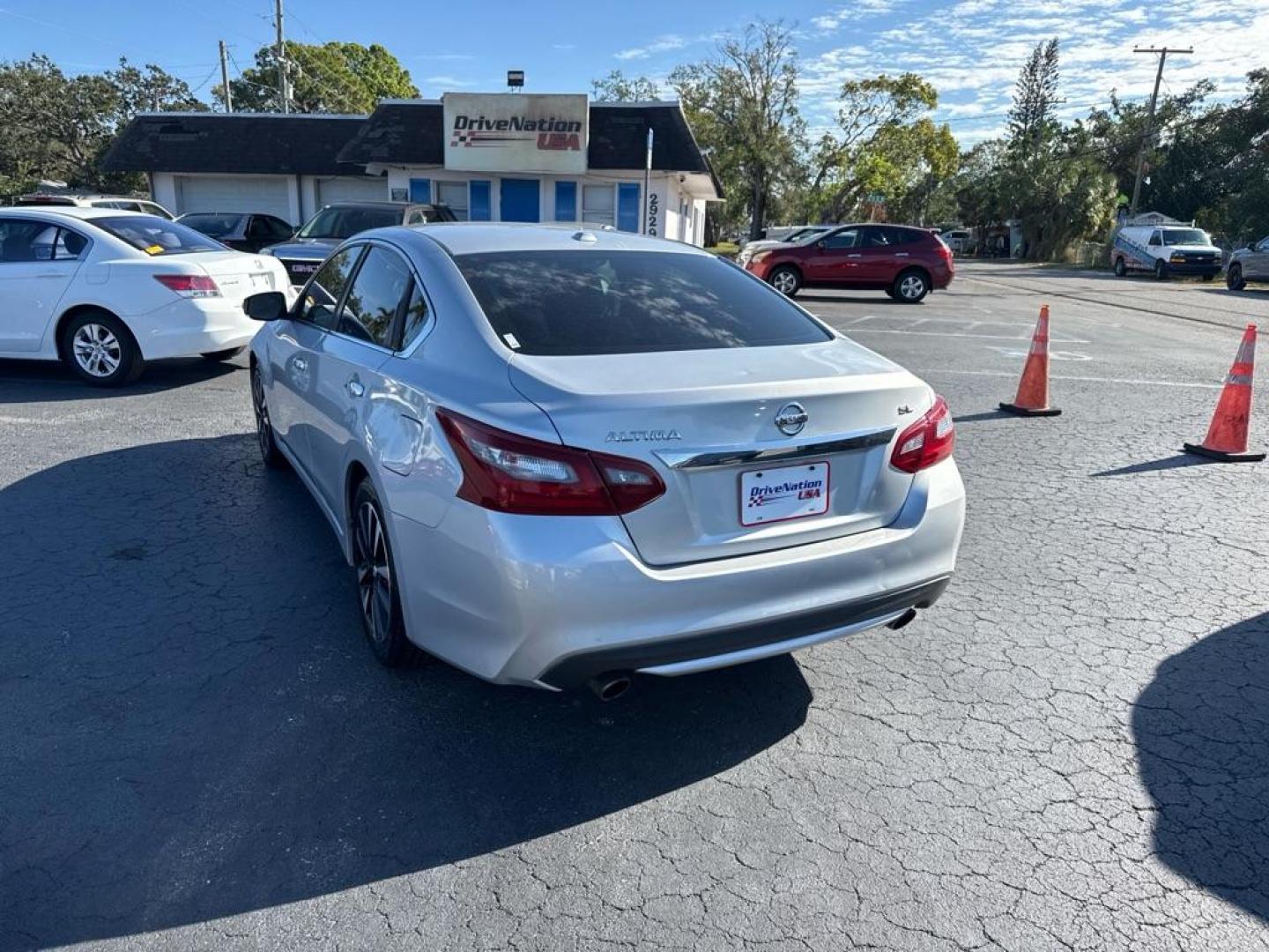 2014 SILVER NISSAN ALTIMA 2.5 (1N4AL3AP4EN) with an 2.5L engine, Continuously Variable transmission, located at 2929 9th St. West, Bradenton, 34205, (941) 242-2810, 27.473591, -82.570679 - Thanks for inquring into DriveNation USA! All vehicles listed can be viewed at www.drivenationusa.com for vehicle history reports and additonal info. We cannot quote any terms such as down payments or monthly payments without an application. You can apply directly at www.drivenationusa.com or by con - Photo#4