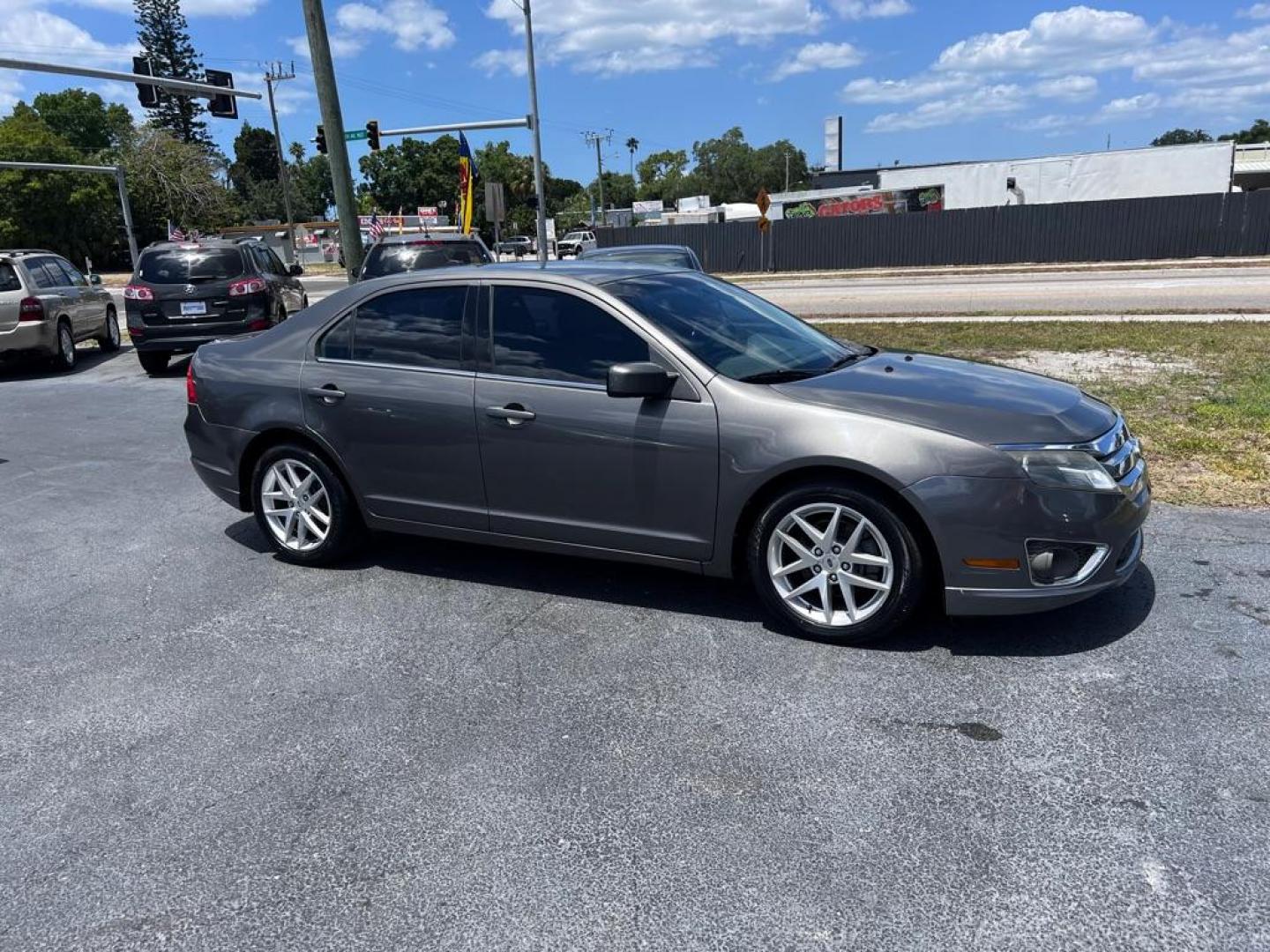 2012 GRAY FORD FUSION SEL (3FAHP0JA2CR) with an 2.5L engine, Automatic transmission, located at 2929 9th St. West, Bradenton, 34205, (941) 242-2810, 27.473591, -82.570679 - Thanks for inquring into DriveNation USA! All vehicles listed can be viewed at www.drivenationusa.com for vehicle history reports and additonal info. We cannot quote any terms such as down payments or monthly payments without an application. You can apply directly at www.drivenationusa.com or by con - Photo#0