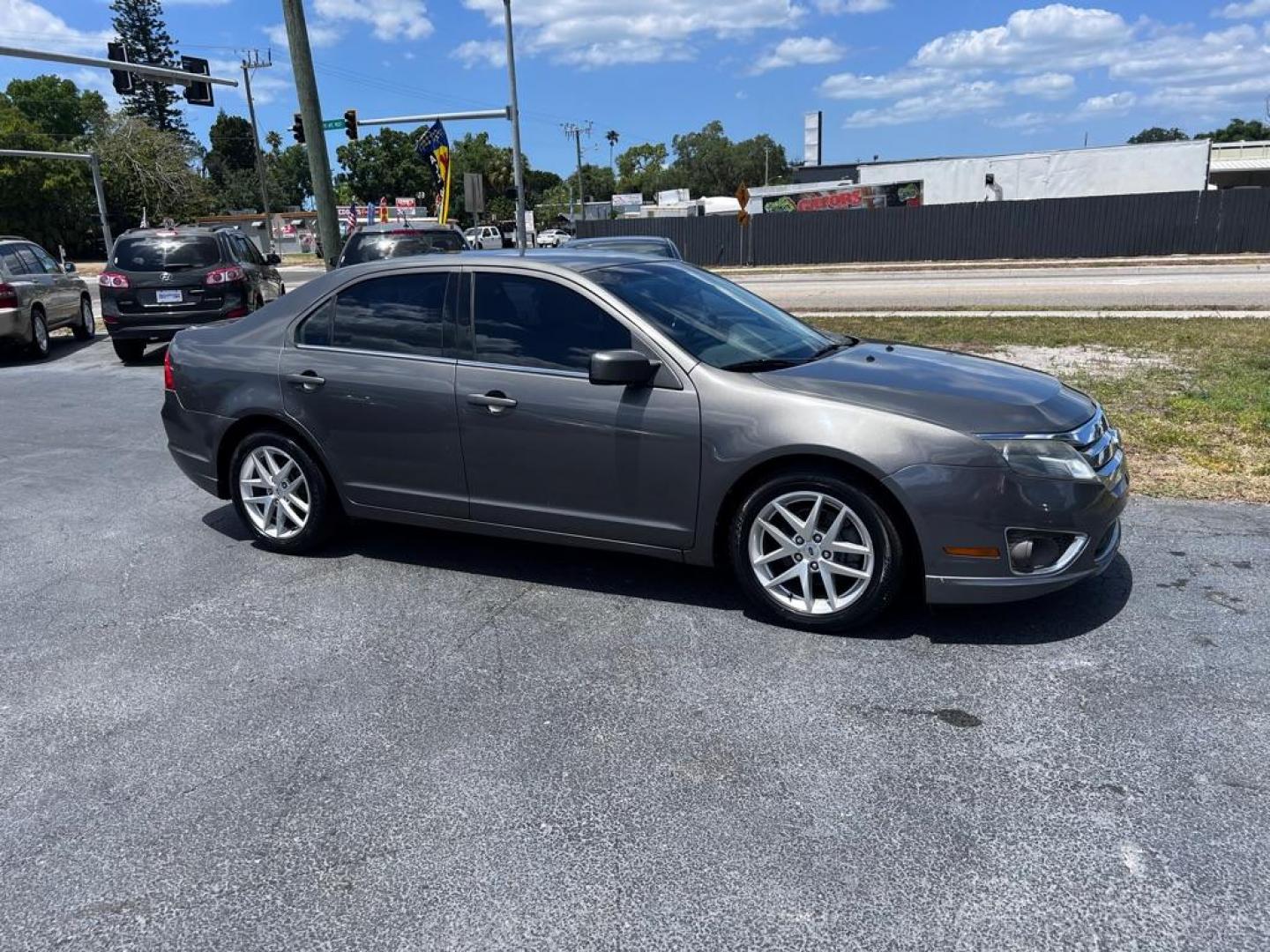 2012 GRAY FORD FUSION SEL (3FAHP0JA2CR) with an 2.5L engine, Automatic transmission, located at 2929 9th St. West, Bradenton, 34205, (941) 242-2810, 27.473591, -82.570679 - Thanks for inquring into DriveNation USA! All vehicles listed can be viewed at www.drivenationusa.com for vehicle history reports and additonal info. We cannot quote any terms such as down payments or monthly payments without an application. You can apply directly at www.drivenationusa.com or by con - Photo#1