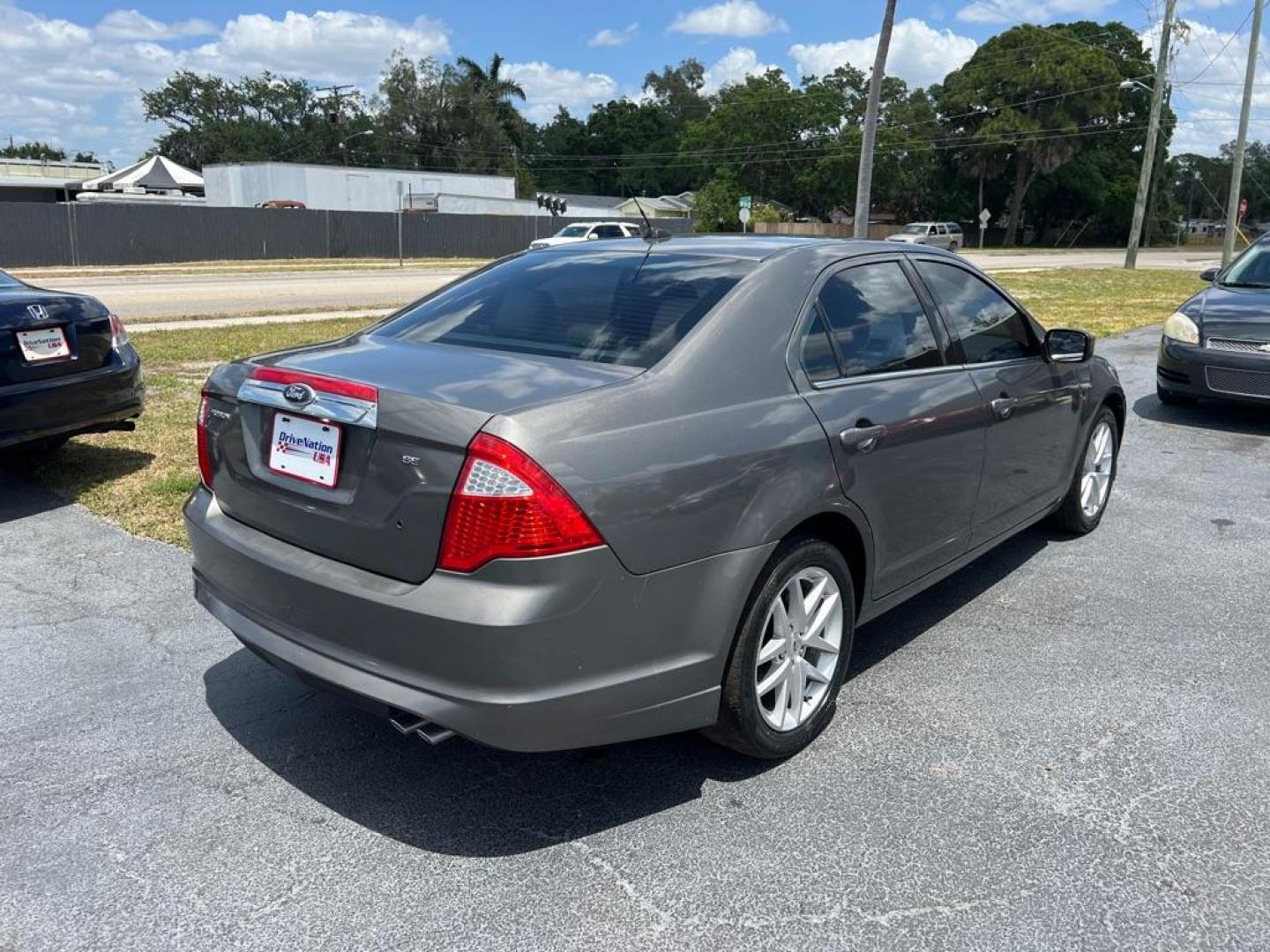 2012 GRAY FORD FUSION SEL (3FAHP0JA2CR) with an 2.5L engine, Automatic transmission, located at 2929 9th St. West, Bradenton, 34205, (941) 242-2810, 27.473591, -82.570679 - Thanks for inquring into DriveNation USA! All vehicles listed can be viewed at www.drivenationusa.com for vehicle history reports and additonal info. We cannot quote any terms such as down payments or monthly payments without an application. You can apply directly at www.drivenationusa.com or by con - Photo#5