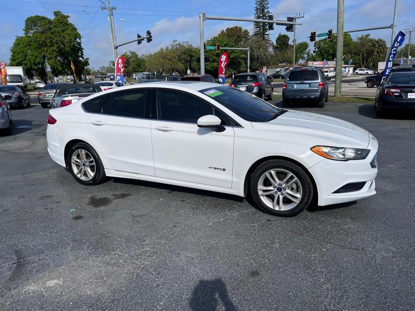 2018 WHITE FORD FUSION SE HYBRID (3FA6P0LU1JR) with an 2.0L engine, Continuously Variable transmission, located at 2929 9th St. West, Bradenton, 34205, (941) 242-2810, 27.473591, -82.570679 - Thanks for inquring into DriveNation USA! All vehicles listed can be viewed at www.drivenationusa.com for vehicle history reports and additonal info. We cannot quote any terms such as down payments or monthly payments without an application. You can apply directly at www.drivenationusa.com or by con - Photo#0
