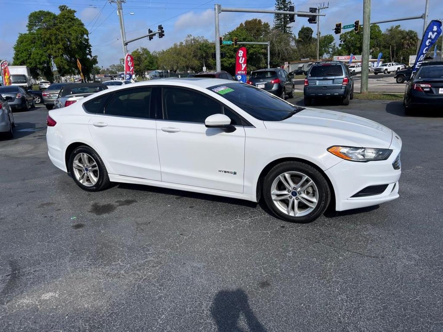 2018 WHITE FORD FUSION SE HYBRID (3FA6P0LU1JR) with an 2.0L engine, Continuously Variable transmission, located at 2929 9th St. West, Bradenton, 34205, (941) 242-2810, 27.473591, -82.570679 - Thanks for inquring into DriveNation USA! All vehicles listed can be viewed at www.drivenationusa.com for vehicle history reports and additonal info. We cannot quote any terms such as down payments or monthly payments without an application. You can apply directly at www.drivenationusa.com or by con - Photo#1