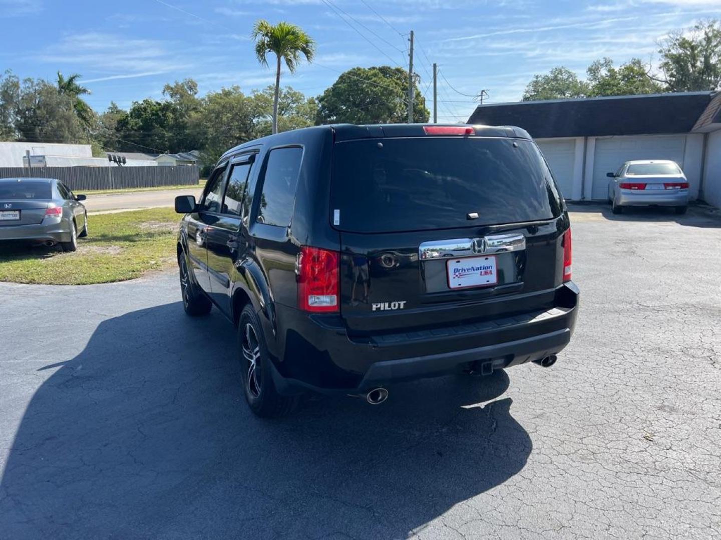 2011 BLACK HONDA PILOT LX (5FNYF3H20BB) with an 3.5L engine, Automatic transmission, located at 2929 9th St. West, Bradenton, 34205, (941) 242-2810, 27.473591, -82.570679 - Thanks for inquring into DriveNation USA! All vehicles listed can be viewed at www.drivenationusa.com for vehicle history reports and additonal info. We cannot quote any terms such as down payments or monthly payments without an application. You can apply directly at www.drivenationusa.com or by con - Photo#5