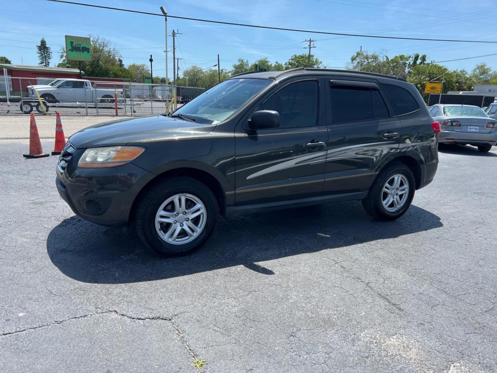 2010 BLACK HYUNDAI SANTA FE GLS (5NMSG3AB8AH) with an 2.4L engine, Automatic transmission, located at 2929 9th St. West, Bradenton, 34205, (941) 242-2810, 27.473591, -82.570679 - Thanks for inquring into DriveNation USA! All vehicles listed can be viewed at www.drivenationusa.com for vehicle history reports and additonal info. We cannot quote any terms such as down payments or monthly payments without an application. You can apply directly at www.drivenationusa.com or by con - Photo #3