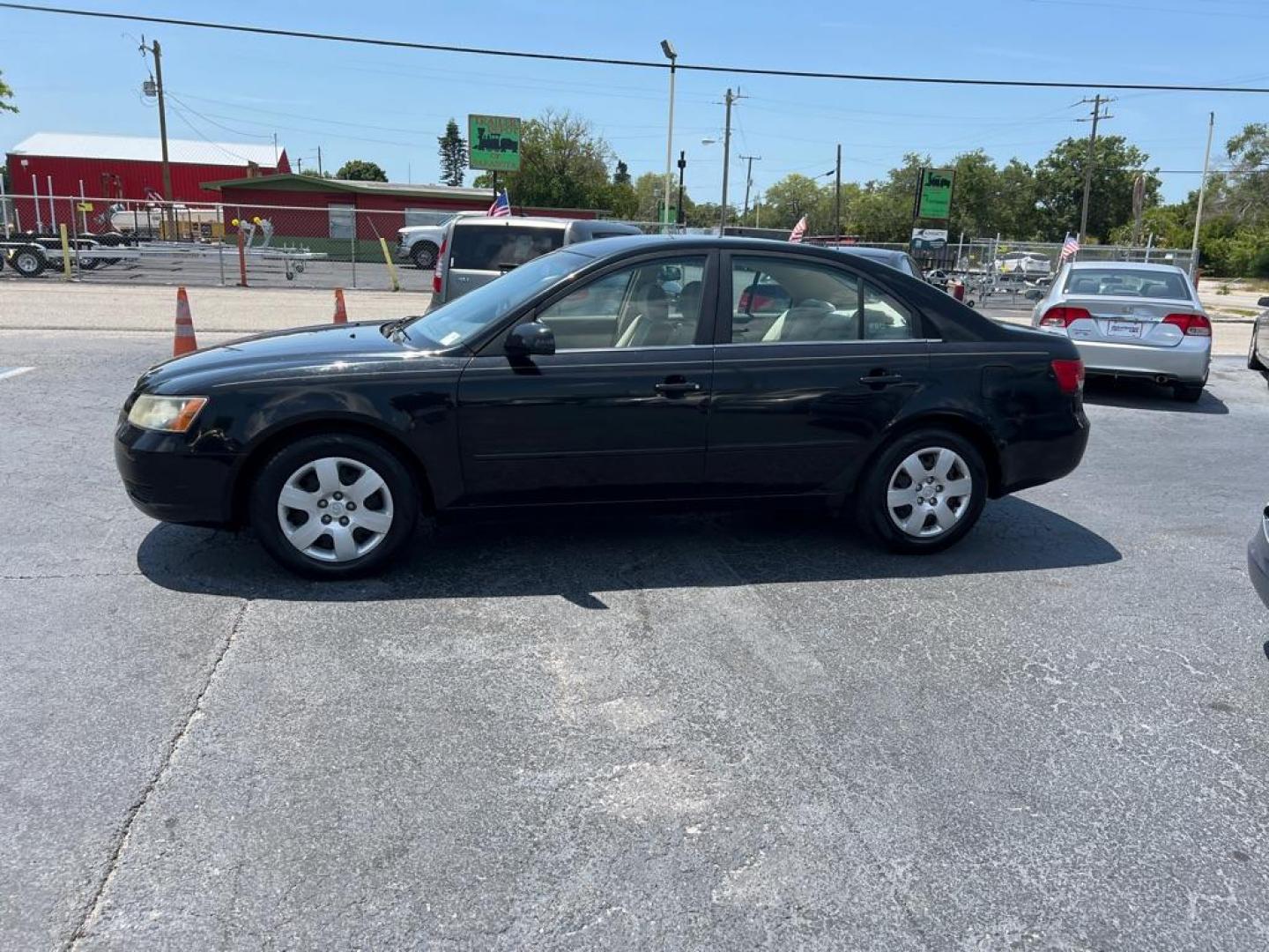 2007 BLACK HYUNDAI SONATA GLS (5NPET46C77H) with an 2.4L engine, Automatic transmission, located at 2929 9th St. West, Bradenton, 34205, (941) 242-2810, 27.473591, -82.570679 - Thanks for inquring into DriveNation USA! All vehicles listed can be viewed at www.drivenationusa.com for vehicle history reports and additonal info. We cannot quote any terms such as down payments or monthly payments without an application. You can apply directly at www.drivenationusa.com or by con - Photo#4