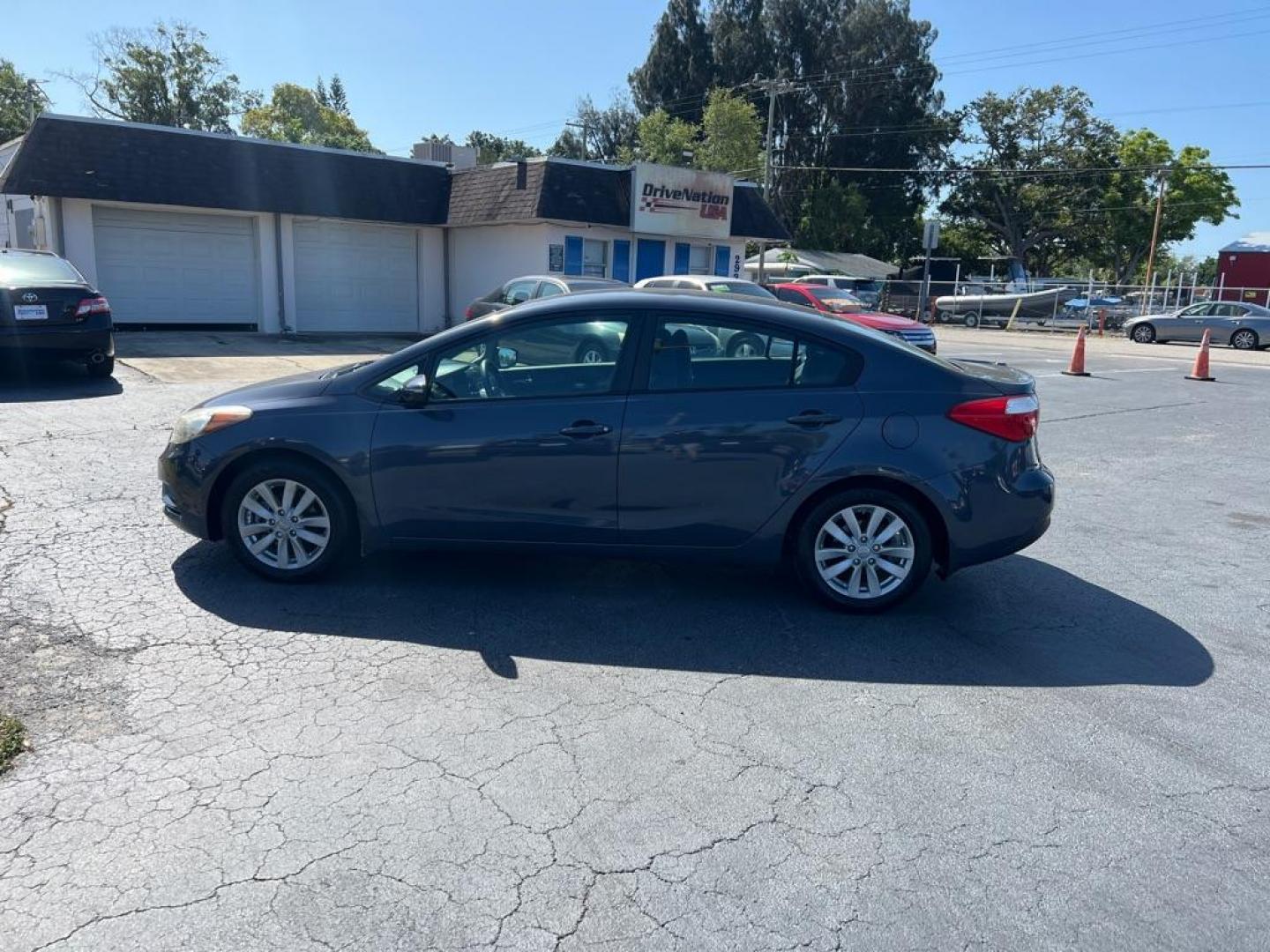 2014 BLUE KIA FORTE LX (KNAFX4A66E5) with an 1.8L engine, Automatic transmission, located at 2929 9th St. West, Bradenton, 34205, (941) 242-2810, 27.473591, -82.570679 - Thanks for inquring into DriveNation USA! All vehicles listed can be viewed at www.drivenationusa.com for vehicle history reports and additonal info. We cannot quote any terms such as down payments or monthly payments without an application. You can apply directly at www.drivenationusa.com or by con - Photo#5