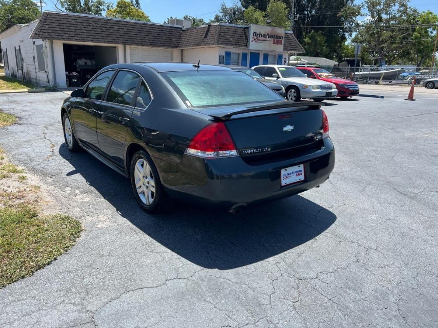 2013 BLACK CHEVROLET IMPALA LT (2G1WG5E37D1) with an 3.6L engine, Automatic transmission, located at 2929 9th St. West, Bradenton, 34205, (941) 242-2810, 27.473591, -82.570679 - Thanks for inquring into DriveNation USA! All vehicles listed can be viewed at www.drivenationusa.com for vehicle history reports and additonal info. We cannot quote any terms such as down payments or monthly payments without an application. You can apply directly at www.drivenationusa.com or by con - Photo#5