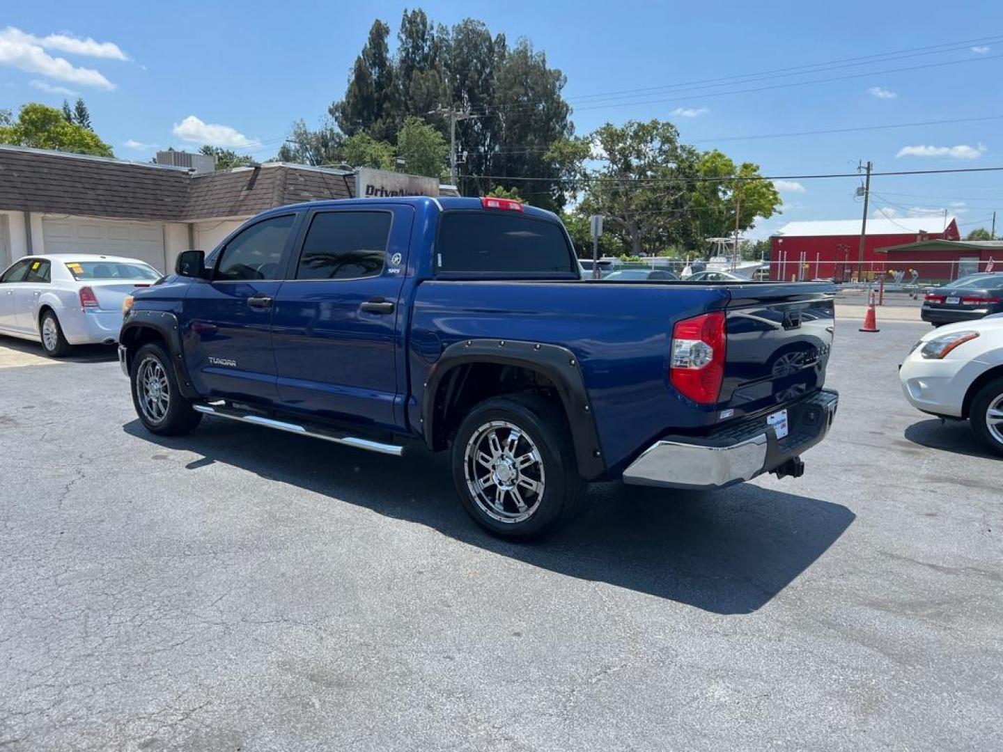 2014 BLUE TOYOTA TUNDRA CREWMAX SR5 (5TFEM5F17EX) with an 4.6L engine, Automatic transmission, located at 2929 9th St. West, Bradenton, 34205, (941) 242-2810, 27.473591, -82.570679 - Thanks for inquring into DriveNation USA! All vehicles listed can be viewed at www.drivenationusa.com for vehicle history reports and additonal info. We cannot quote any terms such as down payments or monthly payments without an application. You can apply directly at www.drivenationusa.com or by con - Photo#5