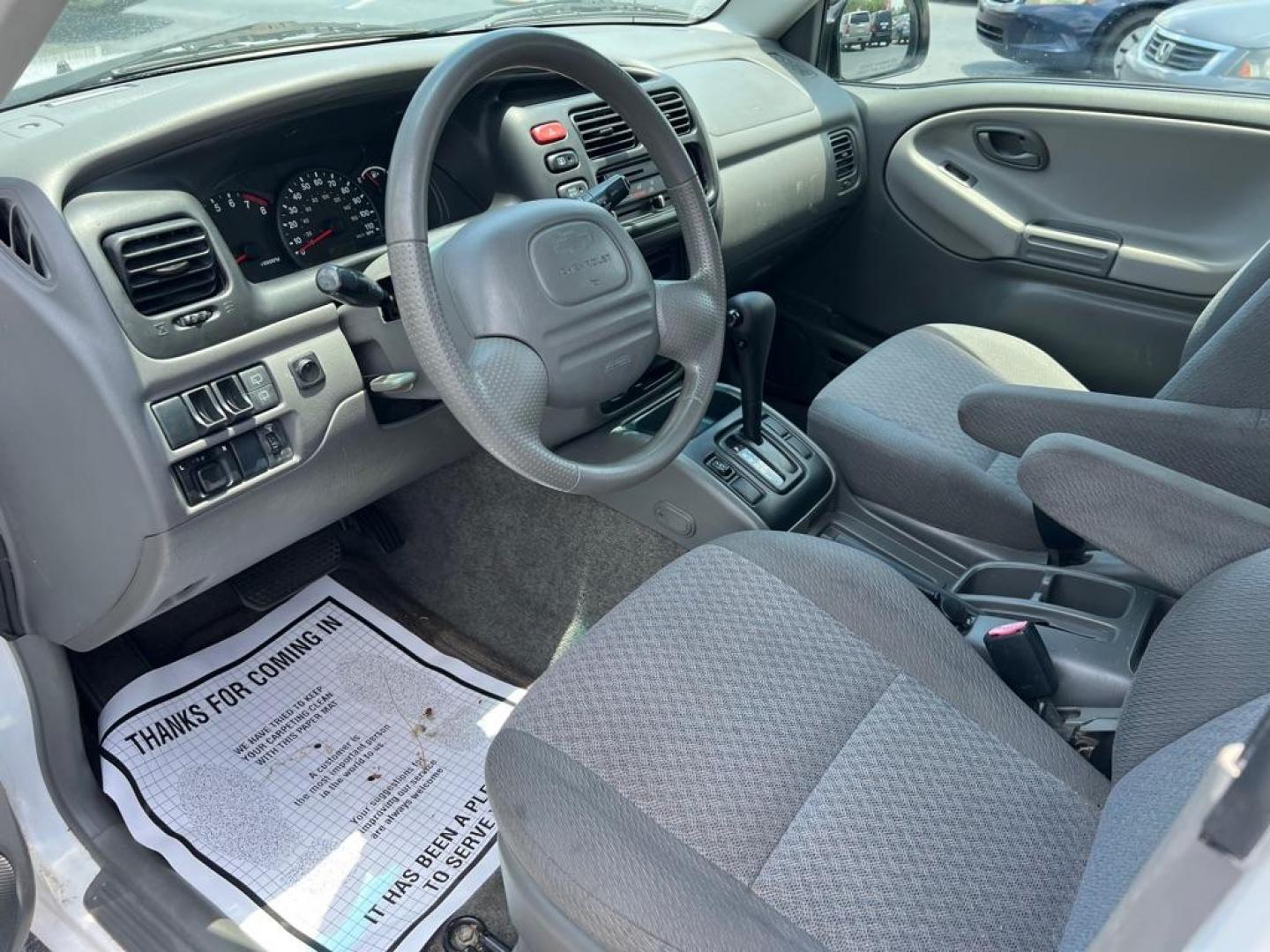 2004 WHITE CHEVROLET TRACKER (2CNBE134646) with an 2.5L engine, Automatic transmission, located at 2929 9th St. West, Bradenton, 34205, (941) 242-2810, 27.473591, -82.570679 - Photo#9