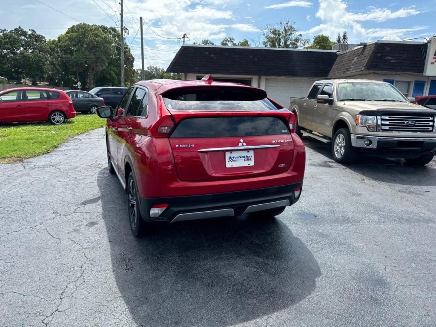 2019 RED MITSUBISHI ECLIPSE CROSS SEL (JA4AT5AA9KZ) with an 1.5L engine, Automatic transmission, located at 2929 9th St. West, Bradenton, 34205, (941) 242-2810, 27.473591, -82.570679 - Thanks for inquring into DriveNation USA! All vehicles listed can be viewed at www.drivenationusa.com for vehicle history reports and additonal info. We cannot quote any terms such as down payments or monthly payments without an application. You can apply directly at www.drivenationusa.com or by con - Photo#5