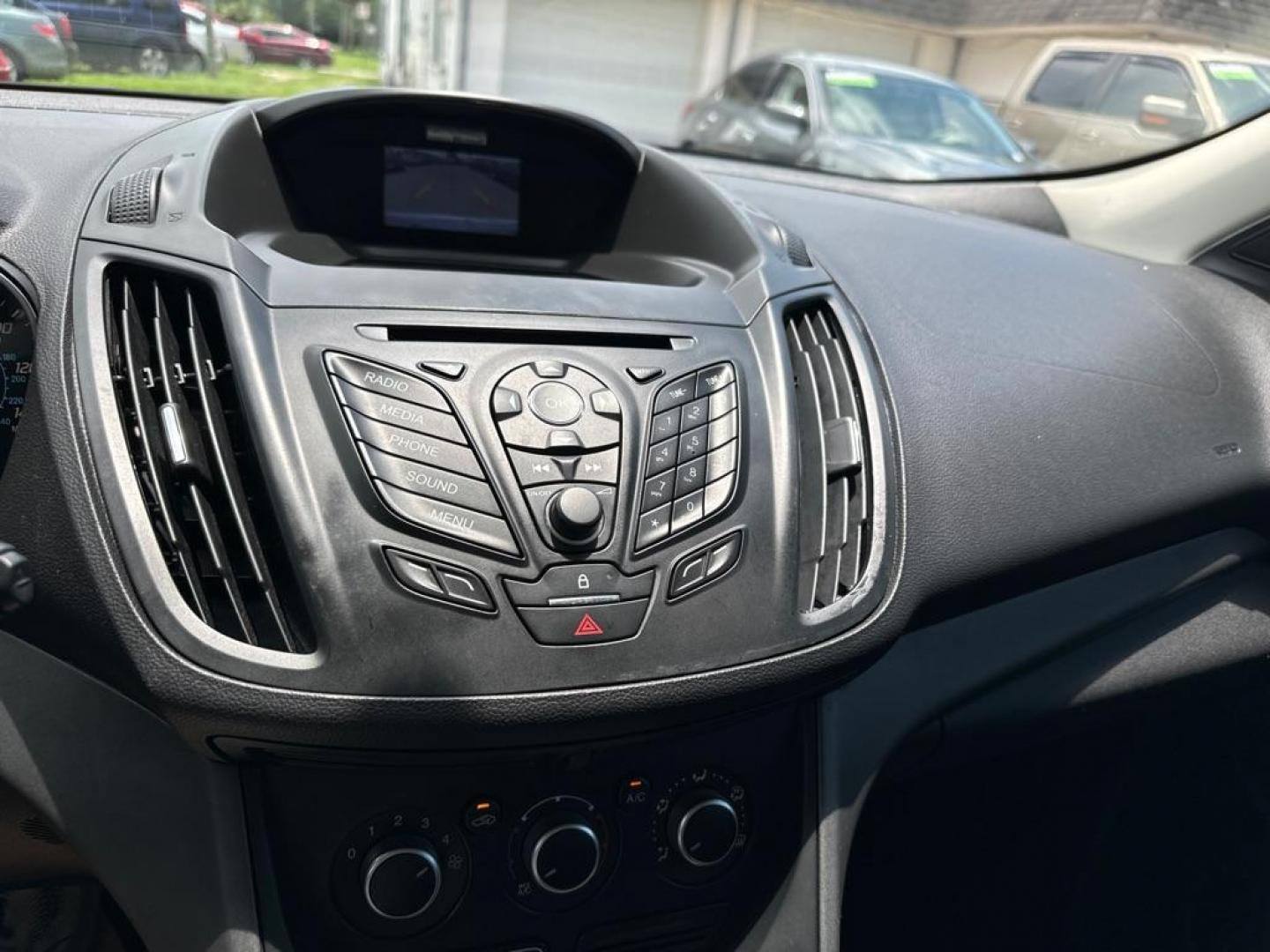 2015 WHITE FORD ESCAPE S (1FMCU0F75FU) with an 2.5L engine, Automatic transmission, located at 2929 9th St. West, Bradenton, 34205, (941) 242-2810, 27.473591, -82.570679 - Photo#11