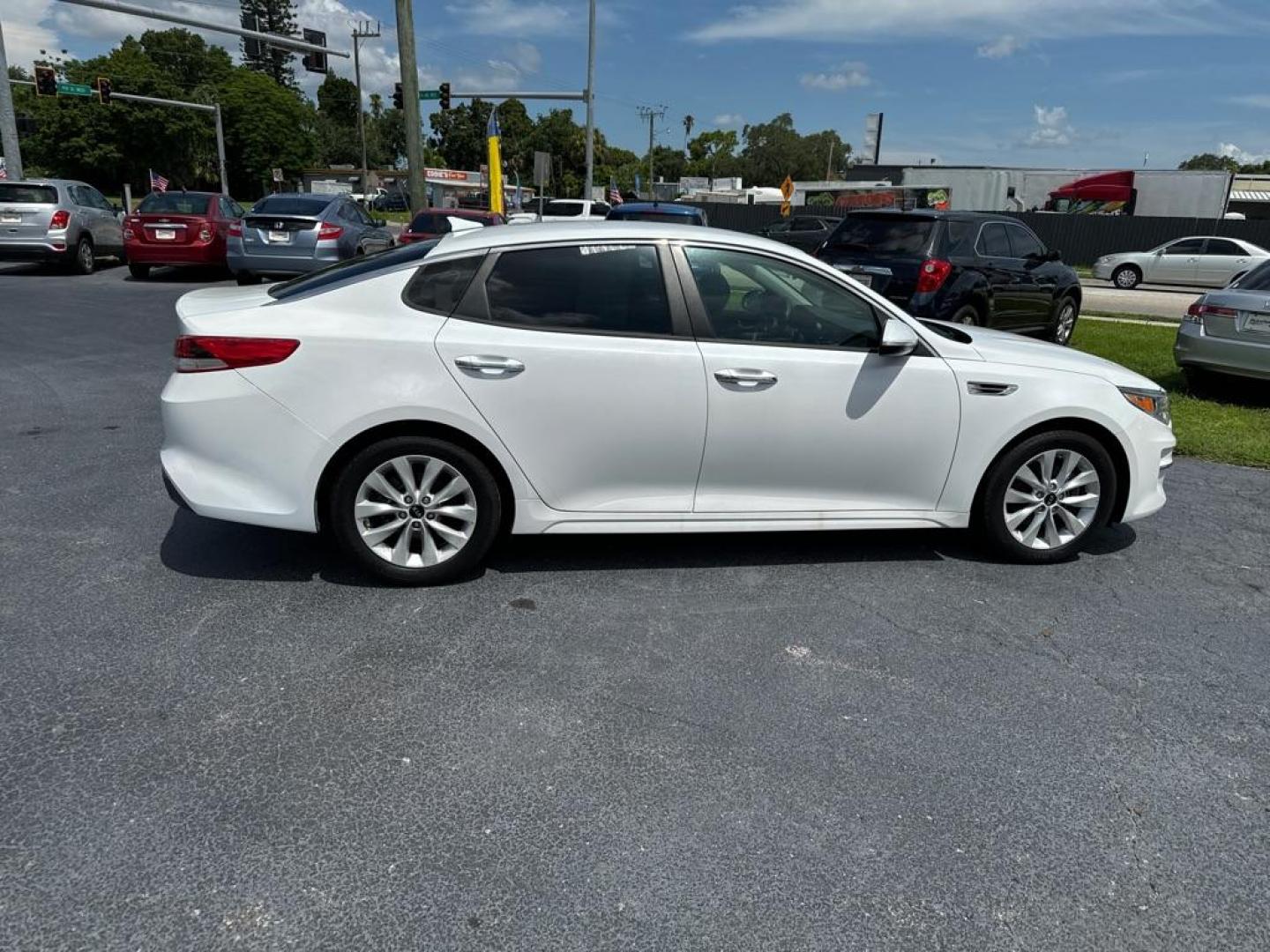 2016 WHITE KIA OPTIMA LX (5XXGT4L34GG) with an 2.4L engine, Automatic transmission, located at 2929 9th St. West, Bradenton, 34205, (941) 242-2810, 27.473591, -82.570679 - Photo#6