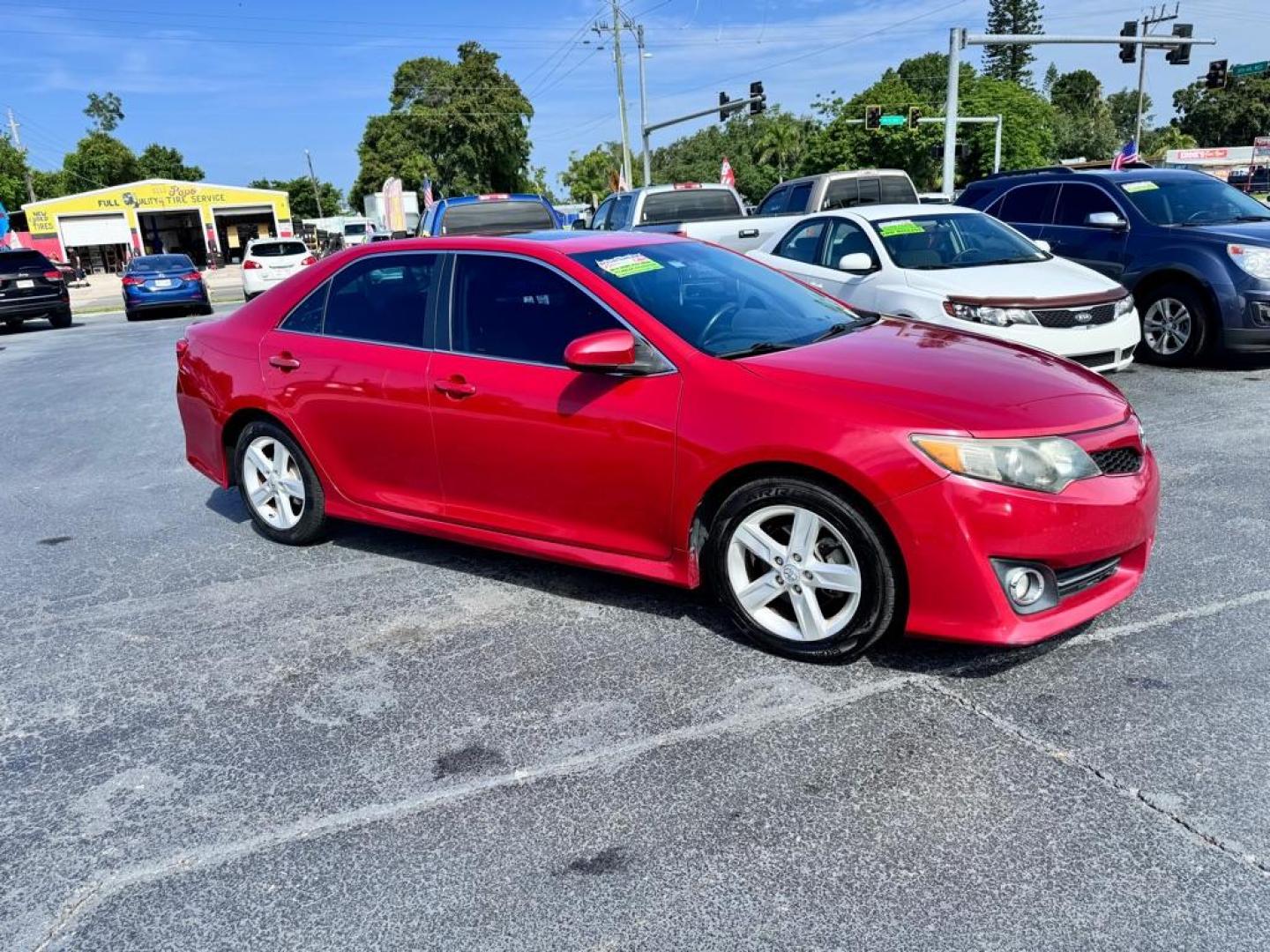 2014 RED TOYOTA CAMRY SE (4T1BF1FK6EU) with an 2.5L engine, Automatic transmission, located at 2929 9th St. West, Bradenton, 34205, (941) 242-2810, 27.473591, -82.570679 - Photo#1