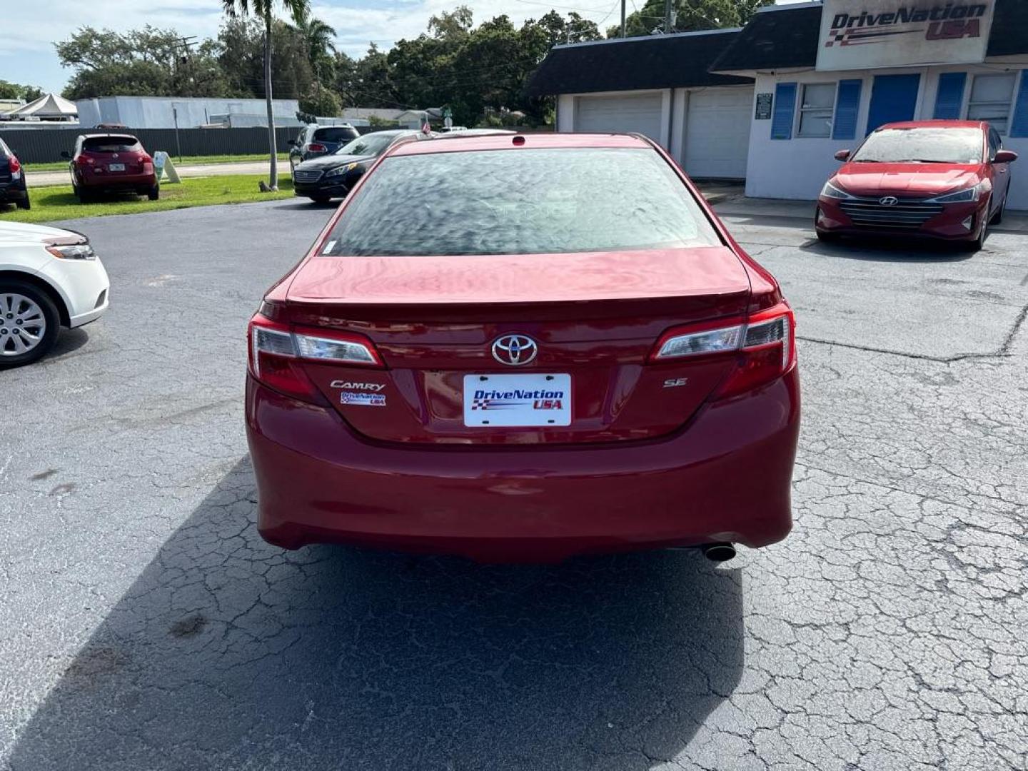 2014 RED TOYOTA CAMRY SE (4T1BF1FK6EU) with an 2.5L engine, Automatic transmission, located at 2929 9th St. West, Bradenton, 34205, (941) 242-2810, 27.473591, -82.570679 - Photo#6