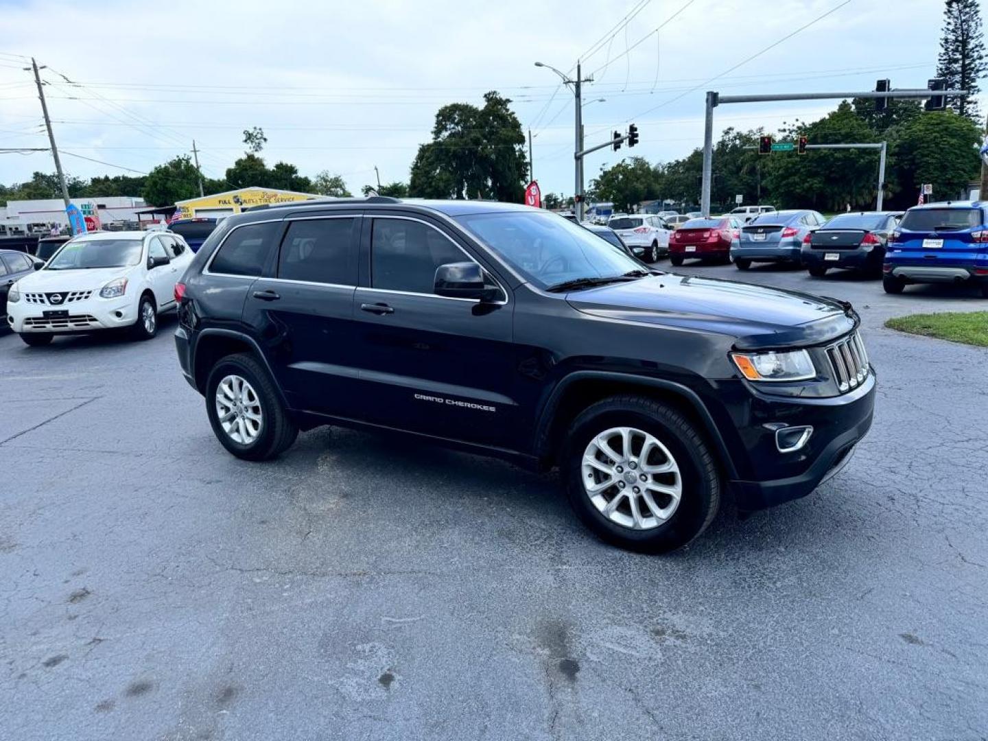2015 BLACK JEEP GRAND CHEROKEE LAREDO (1C4RJFAG4FC) with an 3.6L engine, Automatic transmission, located at 2929 9th St. West, Bradenton, 34205, (941) 242-2810, 27.473591, -82.570679 - Photo#1