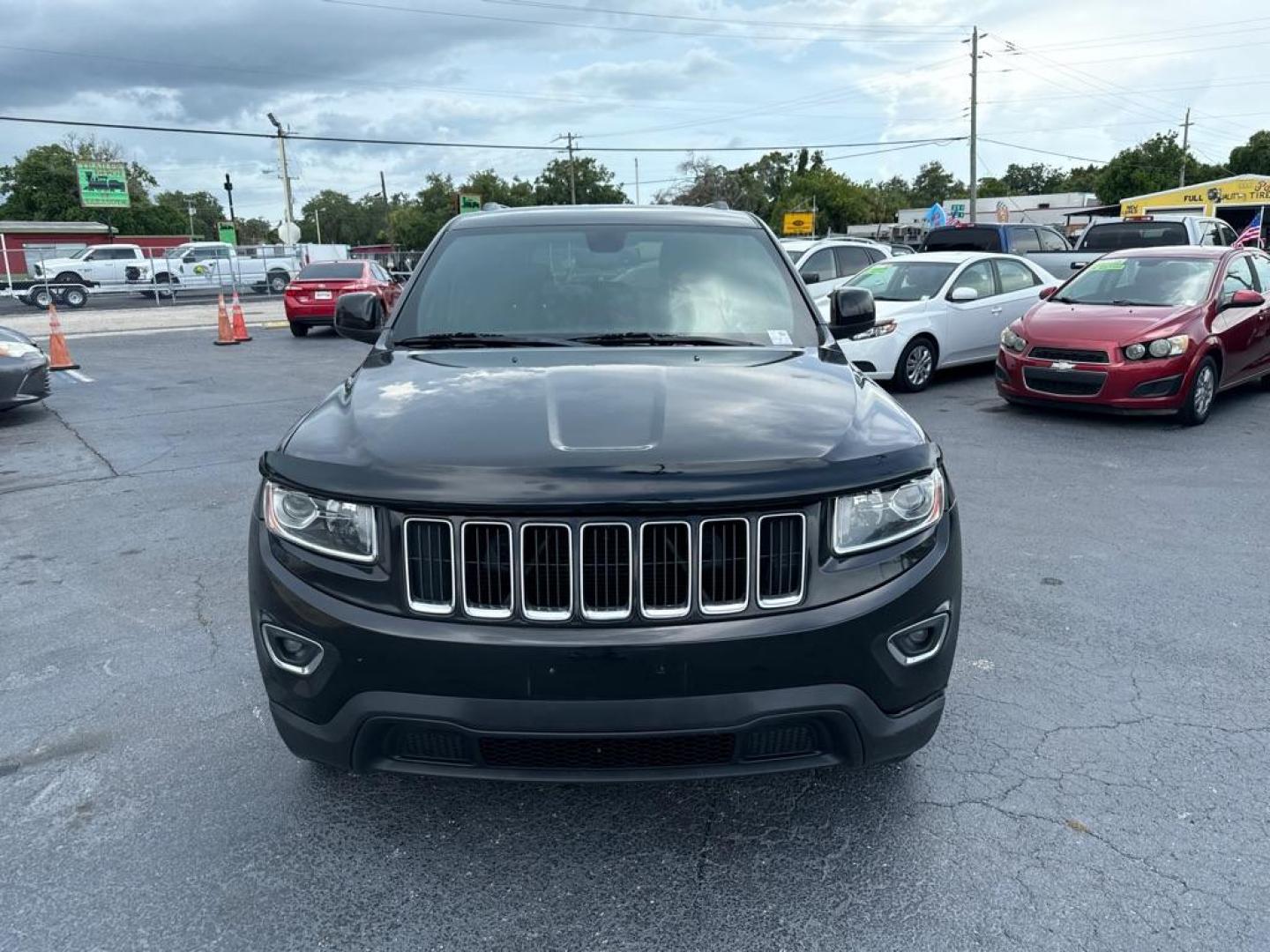 2015 BLACK JEEP GRAND CHEROKEE LAREDO (1C4RJFAG4FC) with an 3.6L engine, Automatic transmission, located at 2929 9th St. West, Bradenton, 34205, (941) 242-2810, 27.473591, -82.570679 - Photo#3