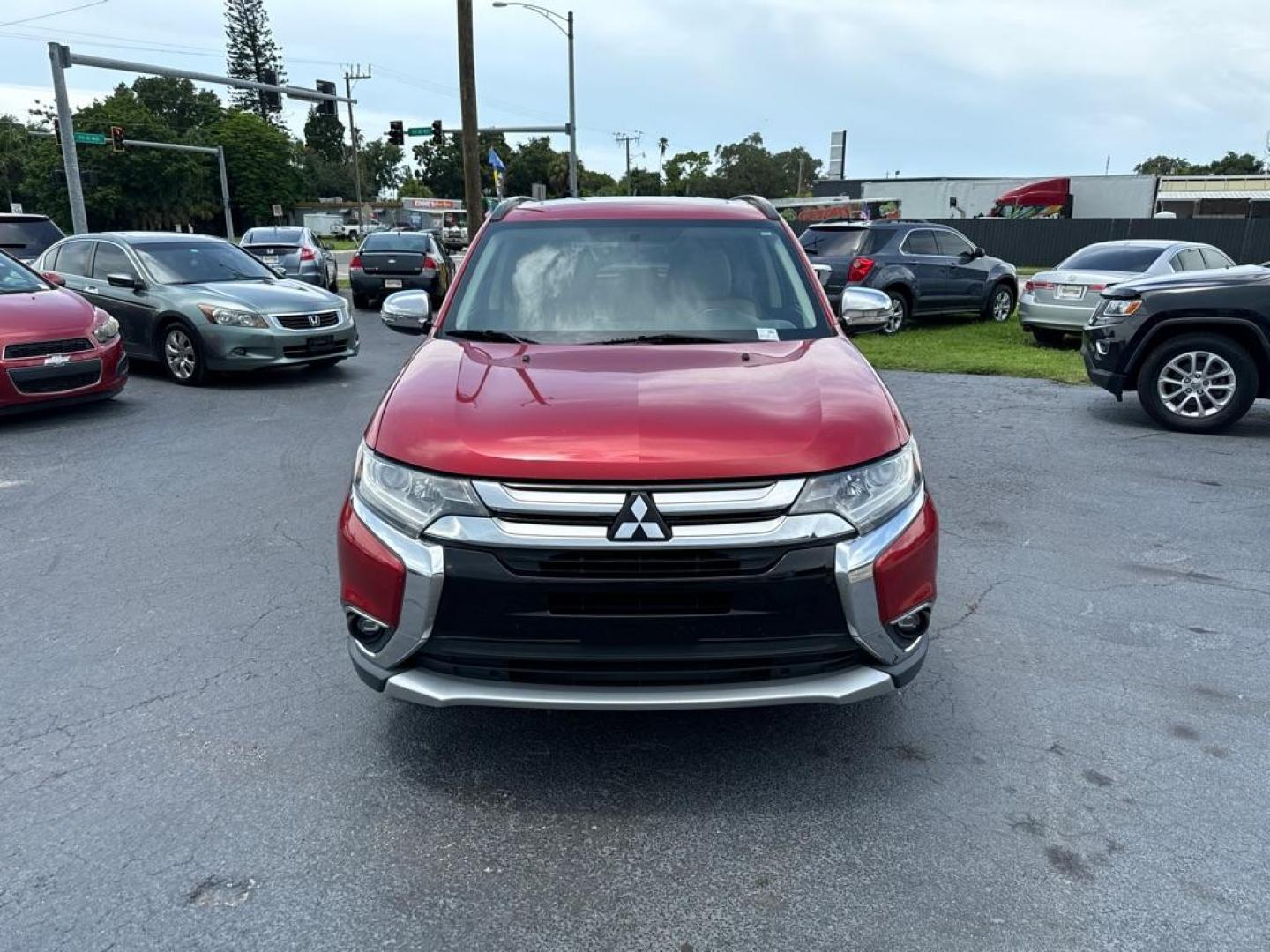 2016 RED MITSUBISHI OUTLANDER SE (JA4AZ3A31GZ) with an 2.4L engine, Automatic transmission, located at 2929 9th St. West, Bradenton, 34205, (941) 242-2810, 27.473591, -82.570679 - Thanks for inquring into DriveNation USA! All vehicles listed can be viewed at www.drivenationusa.com for vehicle history reports and additonal info. We cannot quote any terms such as down payments or monthly payments without an application. You can apply directly at www.drivenationusa.com or by con - Photo#3