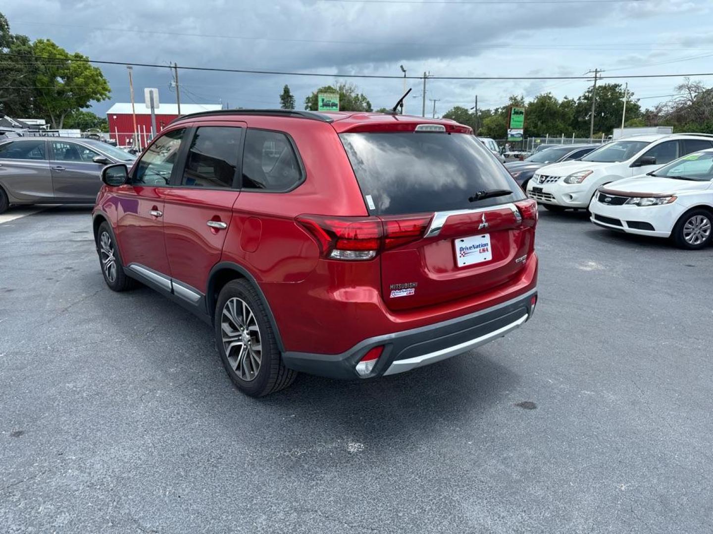 2016 RED MITSUBISHI OUTLANDER SE (JA4AZ3A31GZ) with an 2.4L engine, Automatic transmission, located at 2929 9th St. West, Bradenton, 34205, (941) 242-2810, 27.473591, -82.570679 - Thanks for inquring into DriveNation USA! All vehicles listed can be viewed at www.drivenationusa.com for vehicle history reports and additonal info. We cannot quote any terms such as down payments or monthly payments without an application. You can apply directly at www.drivenationusa.com or by con - Photo#6