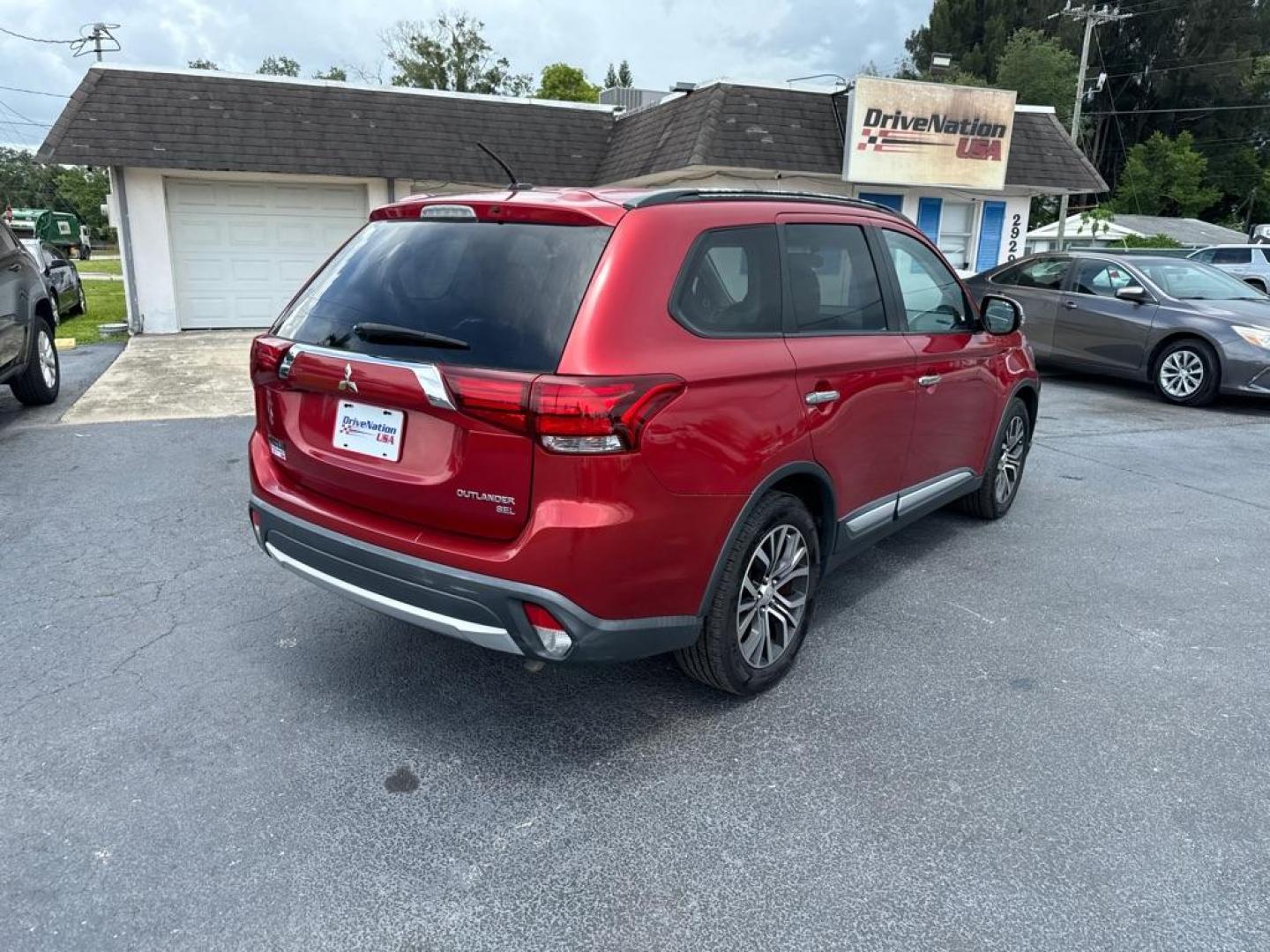 2016 RED MITSUBISHI OUTLANDER SE (JA4AZ3A31GZ) with an 2.4L engine, Automatic transmission, located at 2929 9th St. West, Bradenton, 34205, (941) 242-2810, 27.473591, -82.570679 - Thanks for inquring into DriveNation USA! All vehicles listed can be viewed at www.drivenationusa.com for vehicle history reports and additonal info. We cannot quote any terms such as down payments or monthly payments without an application. You can apply directly at www.drivenationusa.com or by con - Photo#7