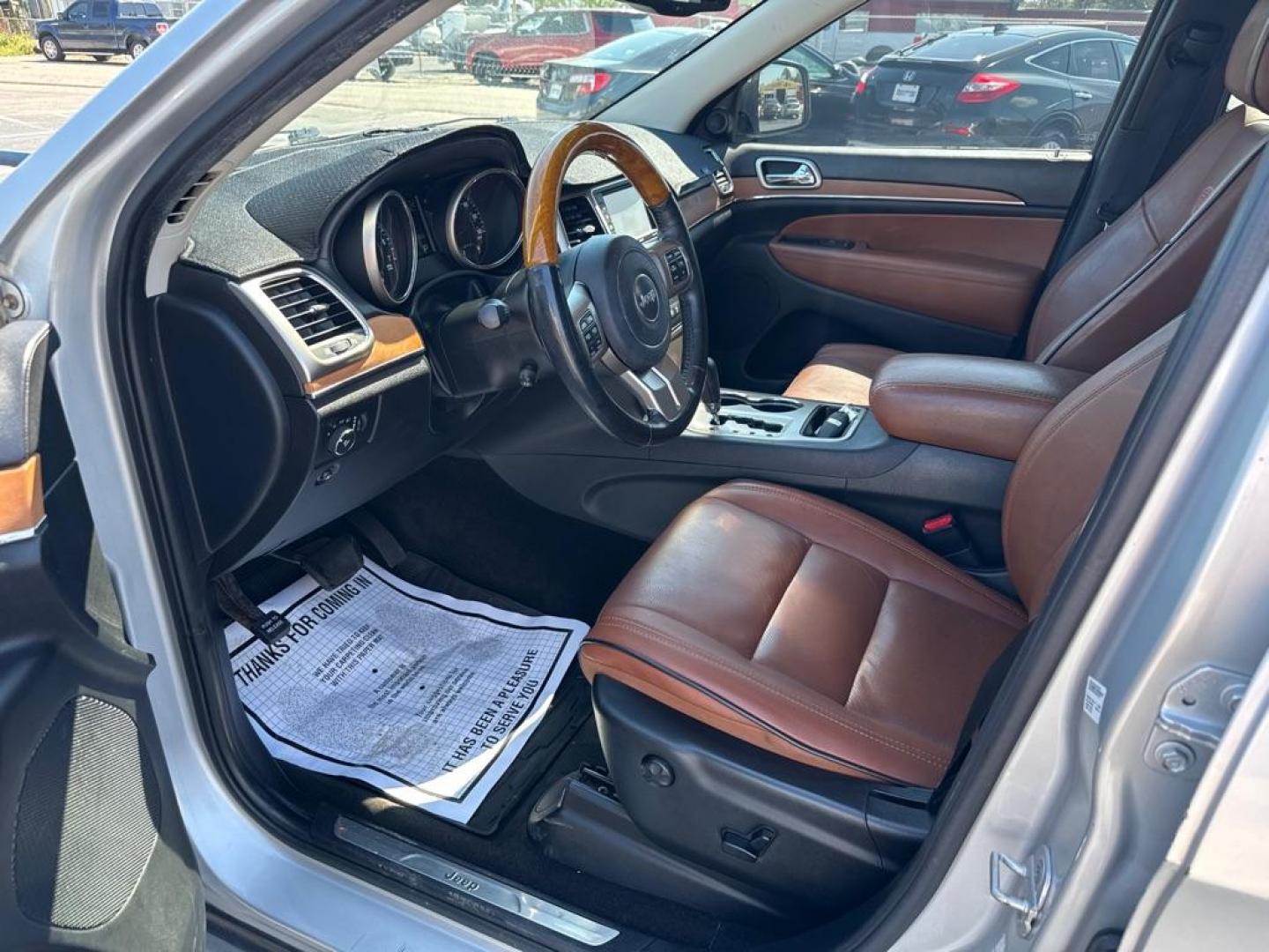 2011 SILVER JEEP GRAND CHEROKEE OVERLAND (1J4RS6GG1BC) with an 3.6L engine, Automatic transmission, located at 2929 9th St. West, Bradenton, 34205, (941) 242-2810, 27.473591, -82.570679 - Photo#12