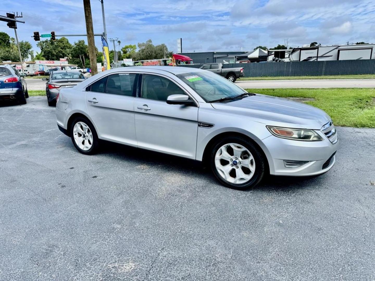 2010 SILVER FORD TAURUS SEL (1FAHP2EWXAG) with an 3.5L engine, Automatic transmission, located at 2929 9th St. West, Bradenton, 34205, (941) 242-2810, 27.473591, -82.570679 - Photo#1