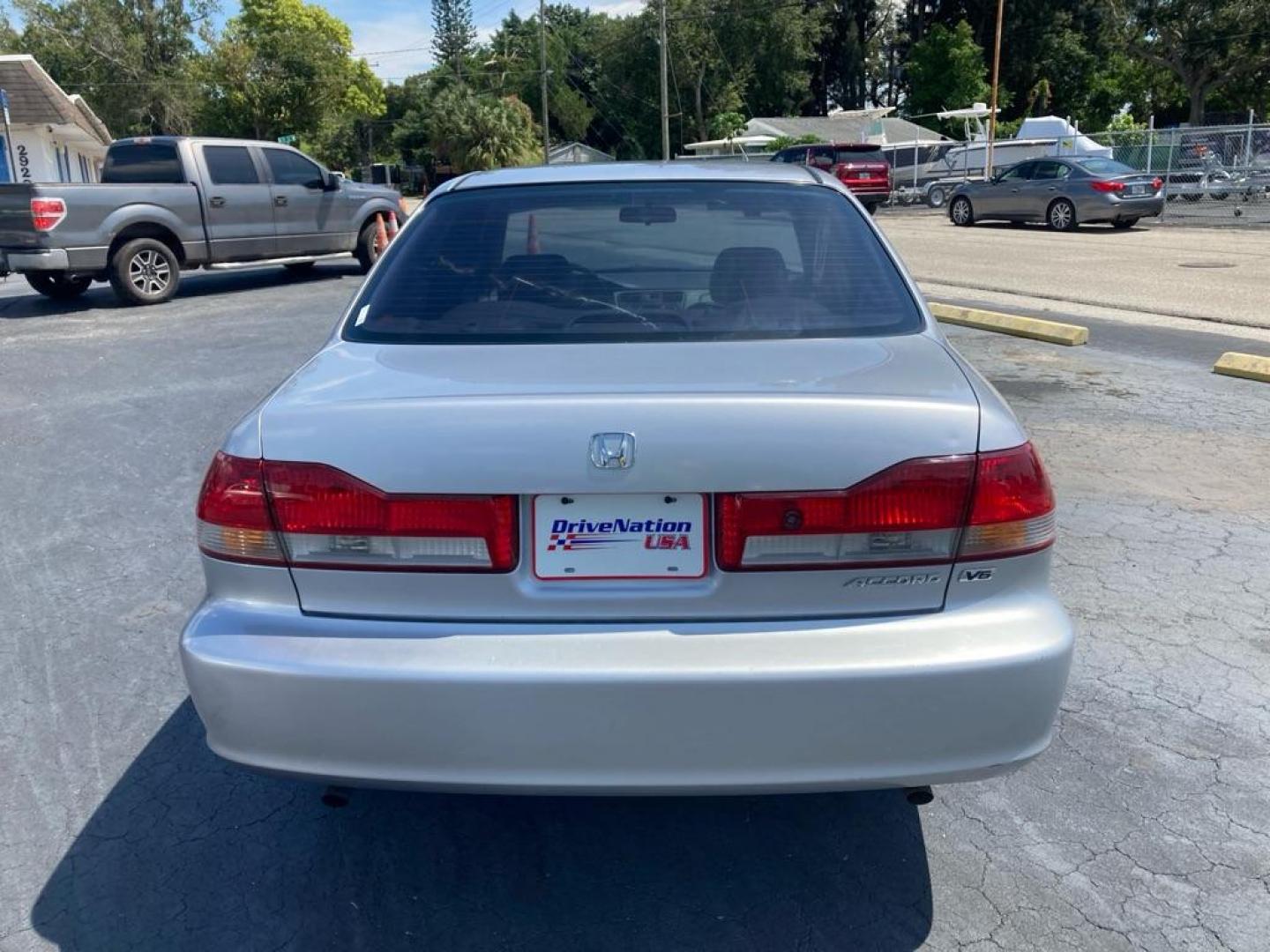 2002 SILVER HONDA ACCORD EX (1HGCG16572A) with an 3.0L engine, Automatic transmission, located at 2929 9th St. West, Bradenton, 34205, (941) 242-2810, 27.473591, -82.570679 - Thanks for inquring into DriveNation USA! All vehicles listed can be viewed at www.drivenationusa.com for vehicle history reports and additonal info. We cannot quote any terms such as down payments or monthly payments without an application. You can apply directly at www.drivenationusa.com or by con - Photo#5