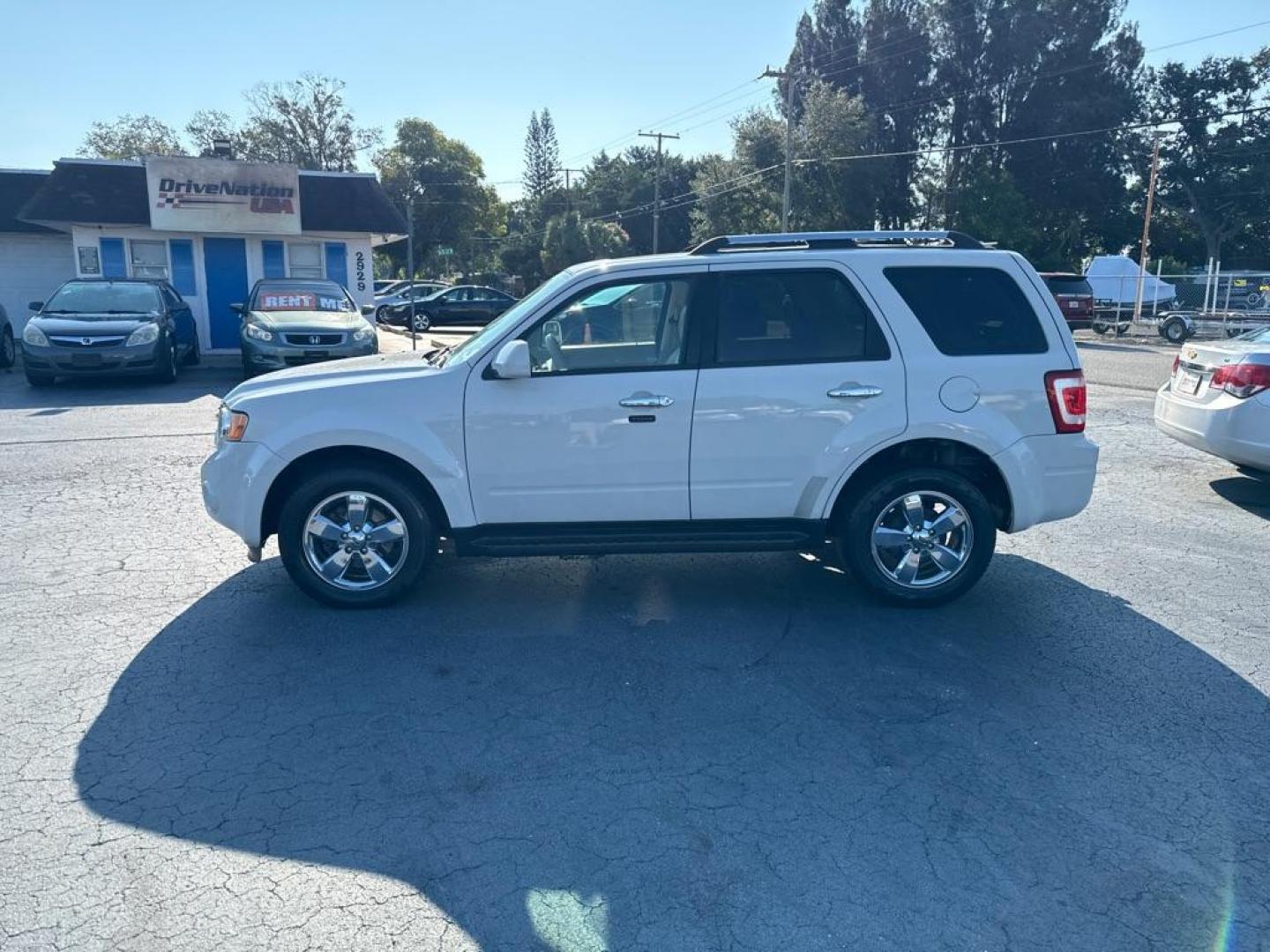 2011 WHITE FORD ESCAPE LIMITED (1FMCU9EG3BK) with an 3.0L engine, Automatic transmission, located at 2929 9th St. West, Bradenton, 34205, (941) 242-2810, 27.473591, -82.570679 - Thanks for inquring into DriveNation USA! All vehicles listed can be viewed at www.drivenationusa.com for vehicle history reports and additonal info. We cannot quote any terms such as down payments or monthly payments without an application. You can apply directly at www.drivenationusa.com or by con - Photo#4