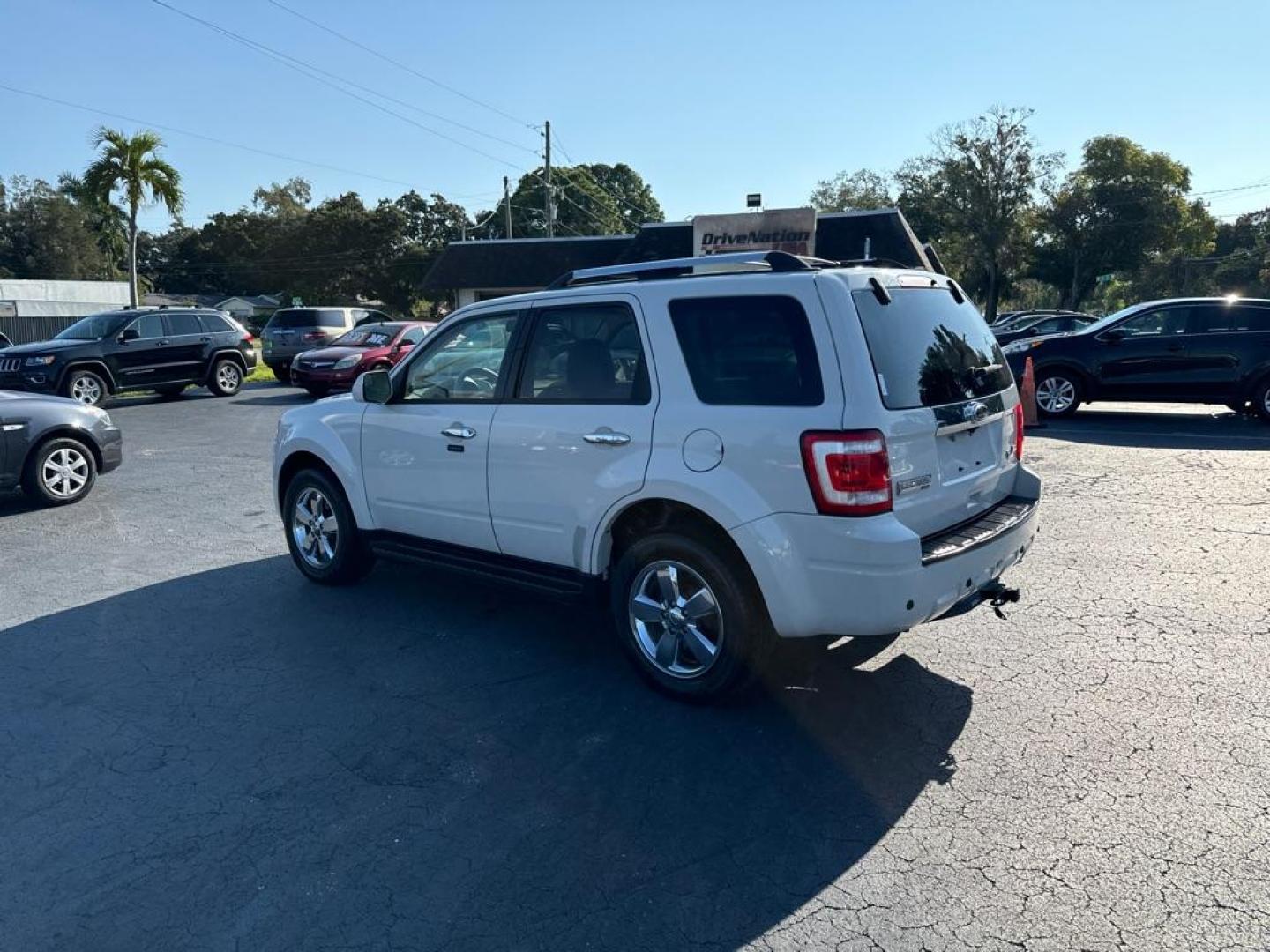 2011 WHITE FORD ESCAPE LIMITED (1FMCU9EG3BK) with an 3.0L engine, Automatic transmission, located at 2929 9th St. West, Bradenton, 34205, (941) 242-2810, 27.473591, -82.570679 - Thanks for inquring into DriveNation USA! All vehicles listed can be viewed at www.drivenationusa.com for vehicle history reports and additonal info. We cannot quote any terms such as down payments or monthly payments without an application. You can apply directly at www.drivenationusa.com or by con - Photo#5