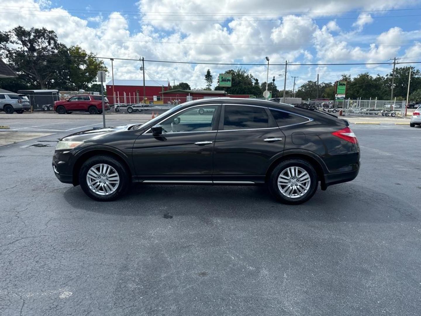 2015 BROWN HONDA CROSSTOUR EX (5J6TF3H39FL) with an 2.4L engine, Automatic transmission, located at 2929 9th St. West, Bradenton, 34205, (941) 242-2810, 27.473591, -82.570679 - Thanks for inquring into DriveNation USA! All vehicles listed can be viewed at www.drivenationusa.com for vehicle history reports and additonal info. We cannot quote any terms such as down payments or monthly payments without an application. You can apply directly at www.drivenationusa.com or by con - Photo#4