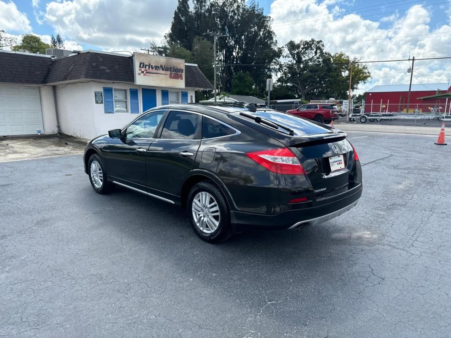 2015 BROWN HONDA CROSSTOUR EX (5J6TF3H39FL) with an 2.4L engine, Automatic transmission, located at 2929 9th St. West, Bradenton, 34205, (941) 242-2810, 27.473591, -82.570679 - Thanks for inquring into DriveNation USA! All vehicles listed can be viewed at www.drivenationusa.com for vehicle history reports and additonal info. We cannot quote any terms such as down payments or monthly payments without an application. You can apply directly at www.drivenationusa.com or by con - Photo#5