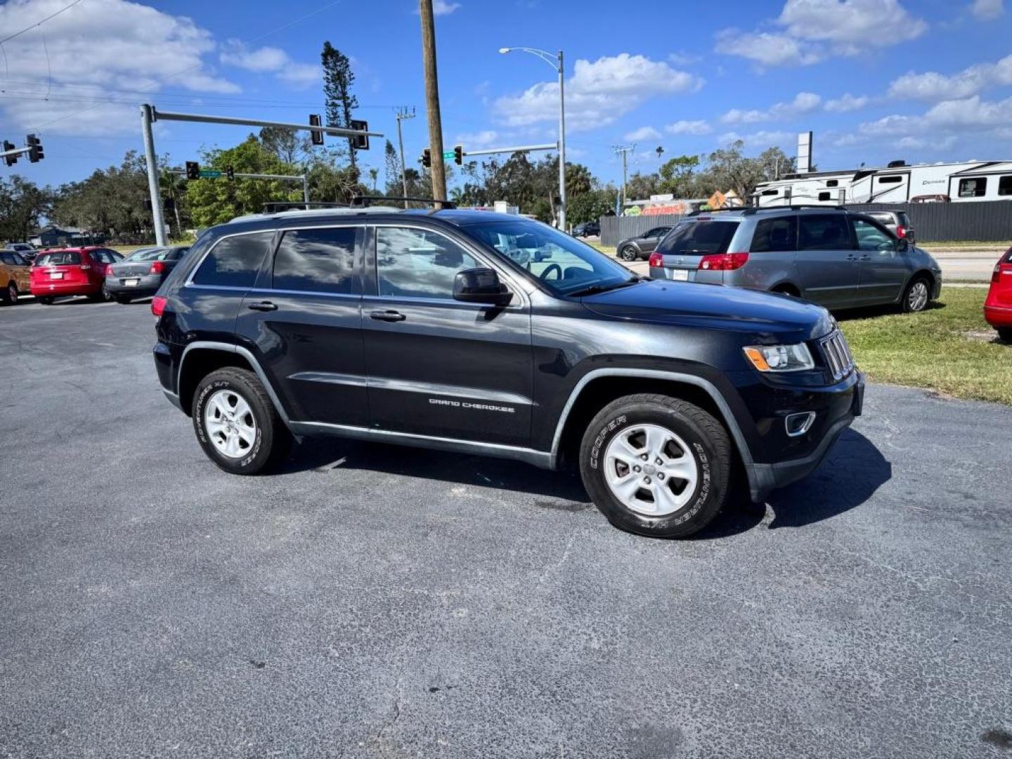2014 BLACK JEEP GRAND CHEROKEE LAREDO (1C4RJFAG5EC) with an 3.6L engine, Automatic transmission, located at 2929 9th St. West, Bradenton, 34205, (941) 242-2810, 27.473591, -82.570679 - Thanks for inquring into DriveNation USA! All vehicles listed can be viewed at www.drivenationusa.com for vehicle history reports and additonal info. We cannot quote any terms such as down payments or monthly payments without an application. You can apply directly at www.drivenationusa.com or by con - Photo#0