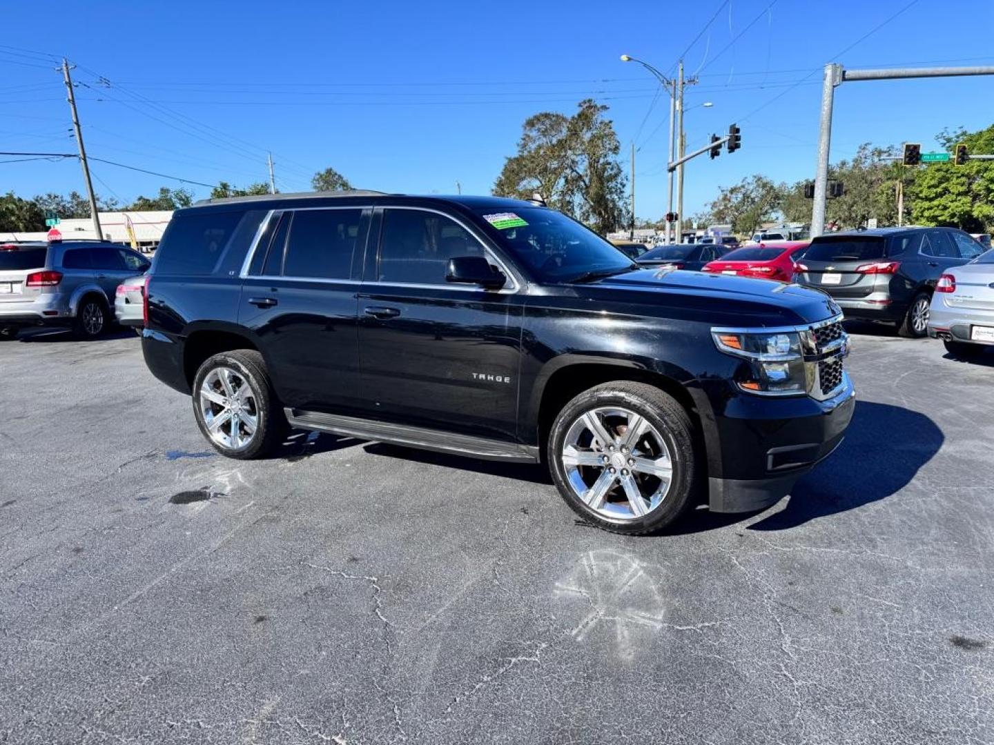 2016 BLACK CHEVROLET TAHOE 1500 LTZ (1GNSCBKC7GR) with an 5.3L engine, Automatic transmission, located at 2929 9th St. West, Bradenton, 34205, (941) 242-2810, 27.473591, -82.570679 - Photo#0