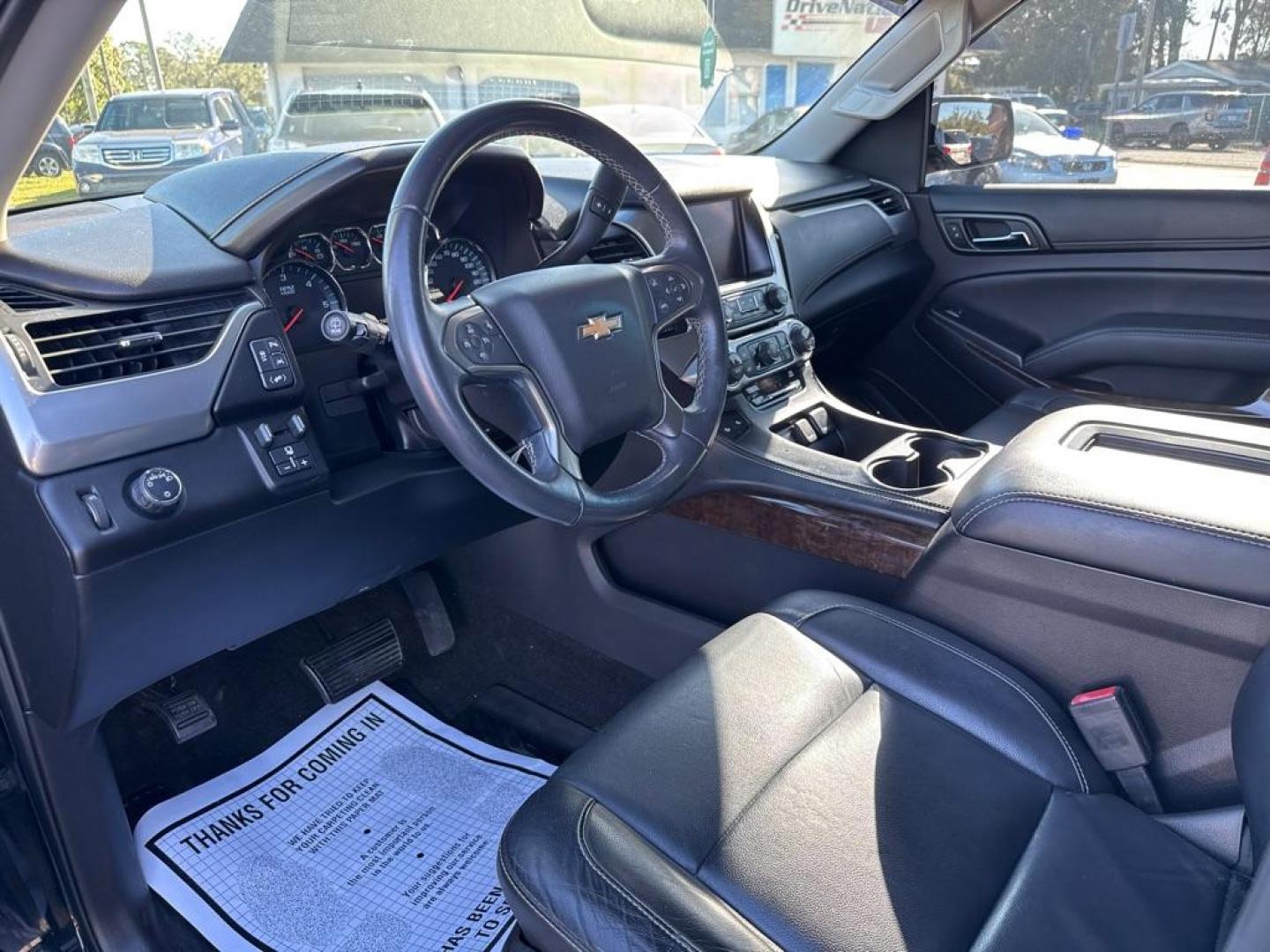 2016 BLACK CHEVROLET TAHOE 1500 LTZ (1GNSCBKC7GR) with an 5.3L engine, Automatic transmission, located at 2929 9th St. West, Bradenton, 34205, (941) 242-2810, 27.473591, -82.570679 - Photo#10