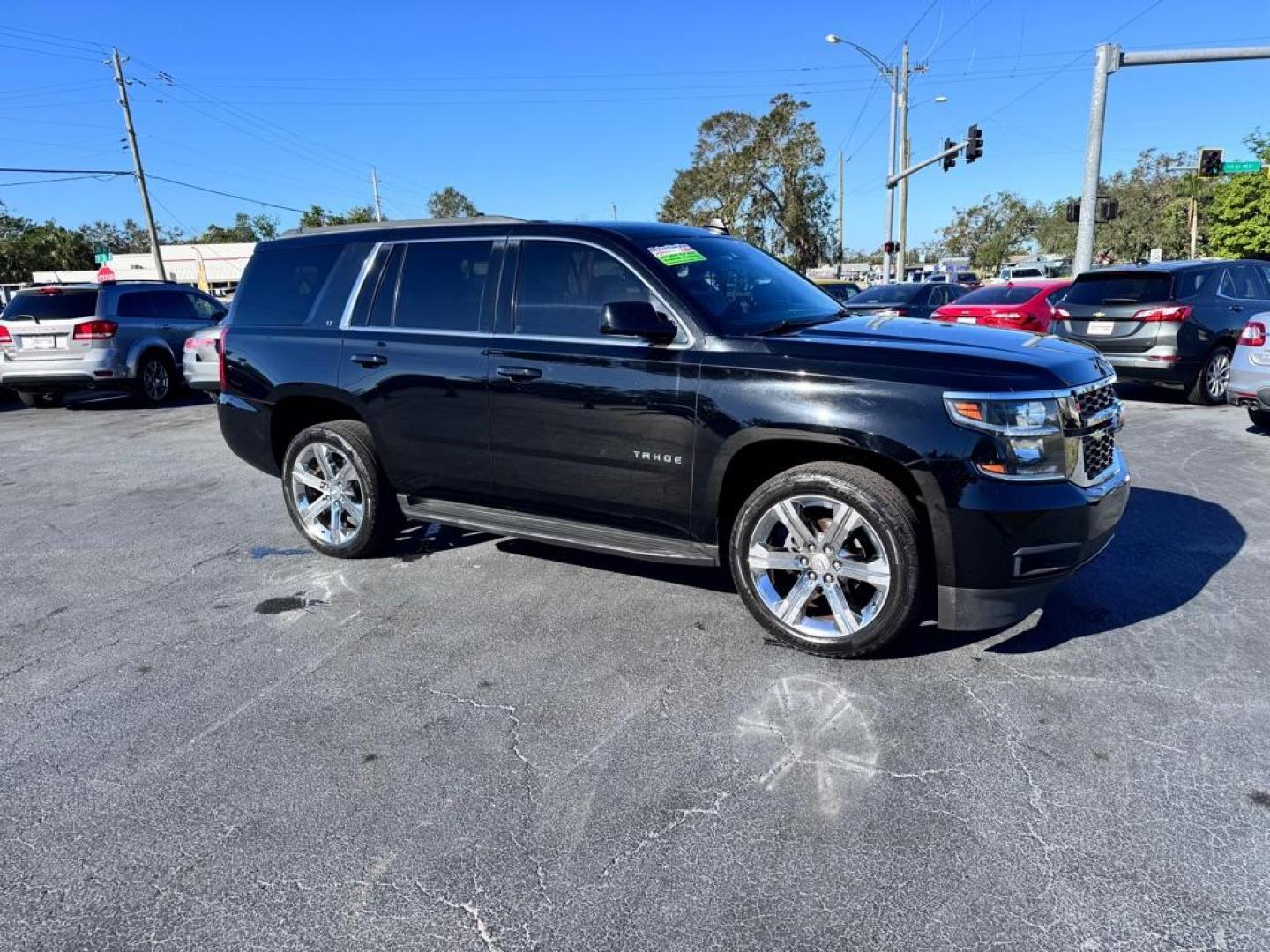 2016 BLACK CHEVROLET TAHOE 1500 LTZ (1GNSCBKC7GR) with an 5.3L engine, Automatic transmission, located at 2929 9th St. West, Bradenton, 34205, (941) 242-2810, 27.473591, -82.570679 - Photo#11