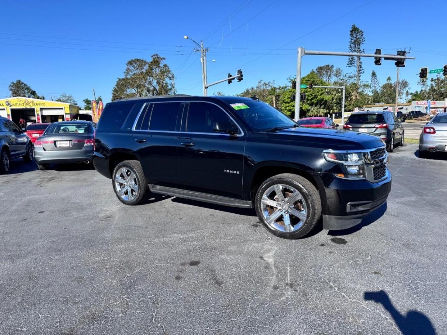 2016 BLACK CHEVROLET TAHOE 1500 LTZ (1GNSCBKC7GR) with an 5.3L engine, Automatic transmission, located at 2929 9th St. West, Bradenton, 34205, (941) 242-2810, 27.473591, -82.570679 - Photo#1