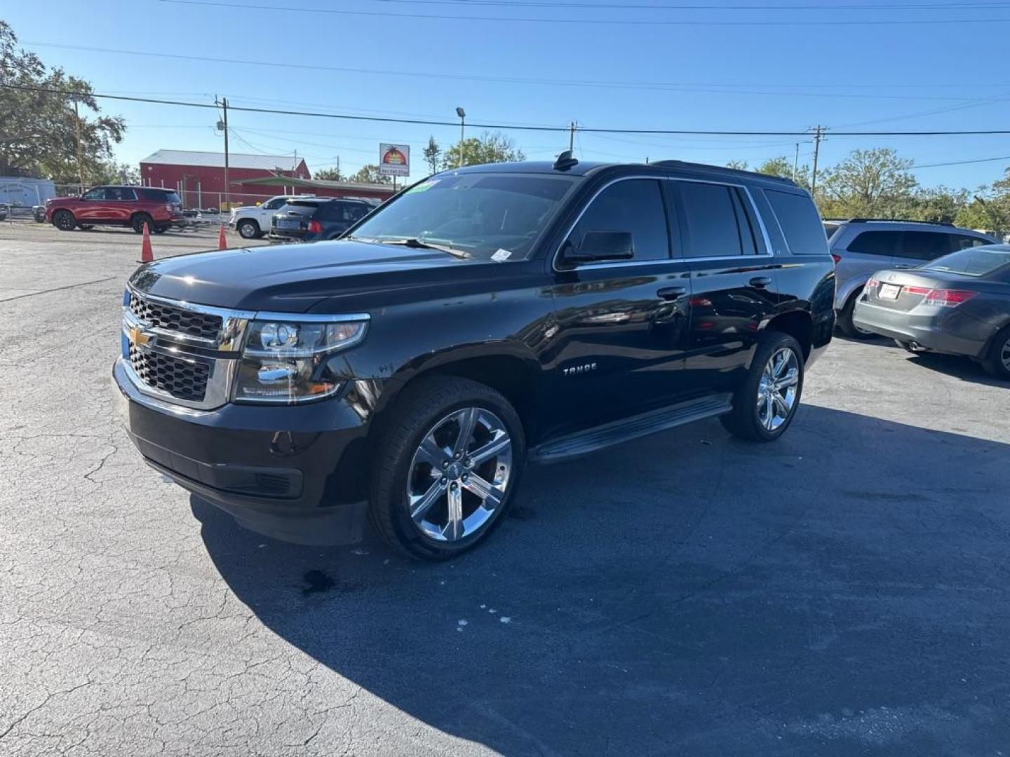 2016 BLACK CHEVROLET TAHOE 1500 LTZ (1GNSCBKC7GR) with an 5.3L engine, Automatic transmission, located at 2929 9th St. West, Bradenton, 34205, (941) 242-2810, 27.473591, -82.570679 - Photo#3