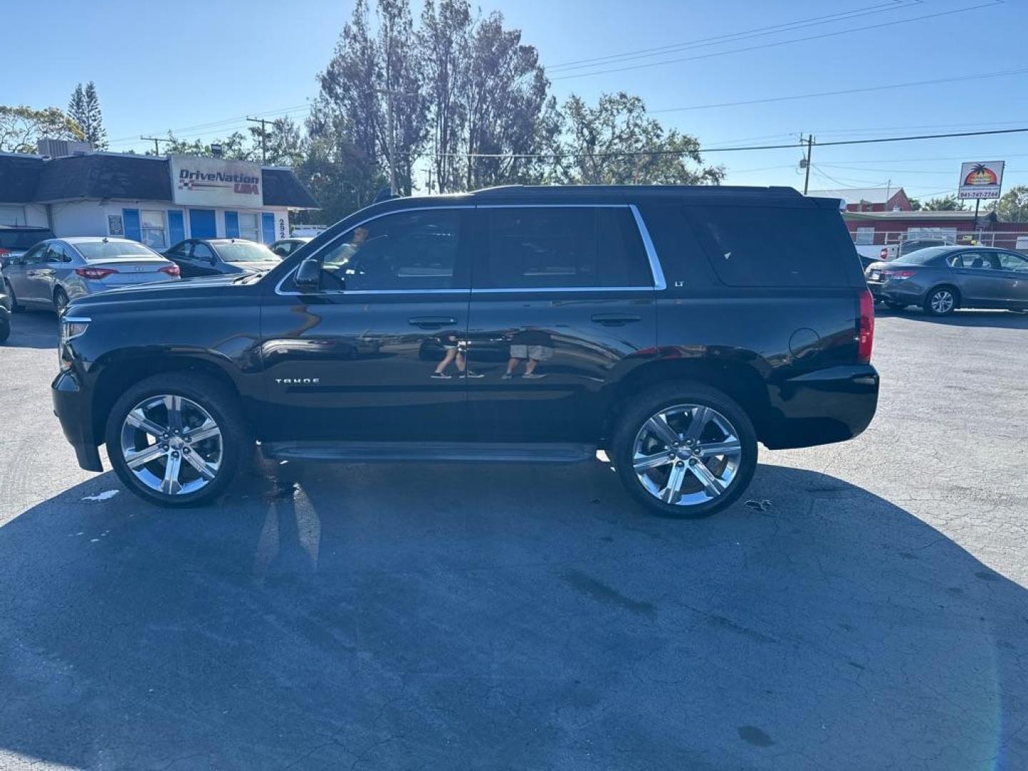 2016 BLACK CHEVROLET TAHOE 1500 LTZ (1GNSCBKC7GR) with an 5.3L engine, Automatic transmission, located at 2929 9th St. West, Bradenton, 34205, (941) 242-2810, 27.473591, -82.570679 - Photo#4