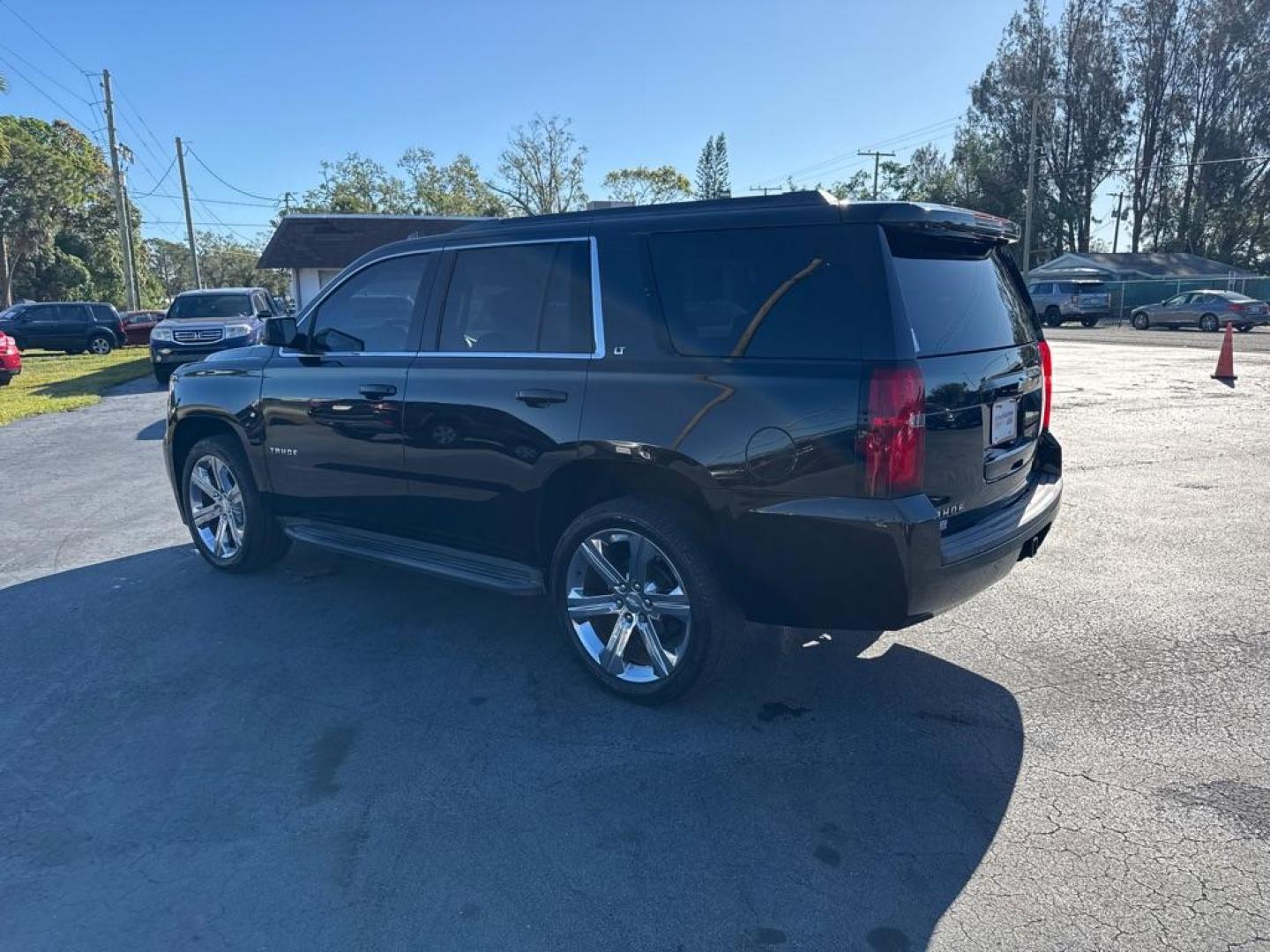 2016 BLACK CHEVROLET TAHOE 1500 LTZ (1GNSCBKC7GR) with an 5.3L engine, Automatic transmission, located at 2929 9th St. West, Bradenton, 34205, (941) 242-2810, 27.473591, -82.570679 - Photo#5