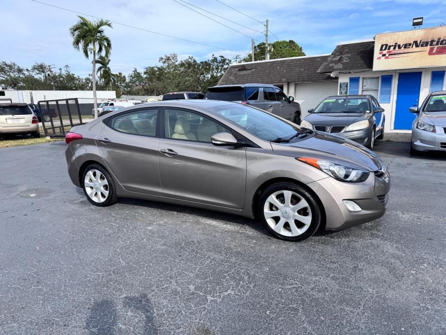 2012 TAN HYUNDAI ELANTRA GLS (5NPDH4AE2CH) with an 1.8L engine, Automatic transmission, located at 2929 9th St. West, Bradenton, 34205, (941) 242-2810, 27.473591, -82.570679 - Thanks for inquring into DriveNation USA! All vehicles listed can be viewed at www.drivenationusa.com for vehicle history reports and additonal info. We cannot quote any terms such as down payments or monthly payments without an application. You can apply directly at www.drivenationusa.com or by con - Photo#0