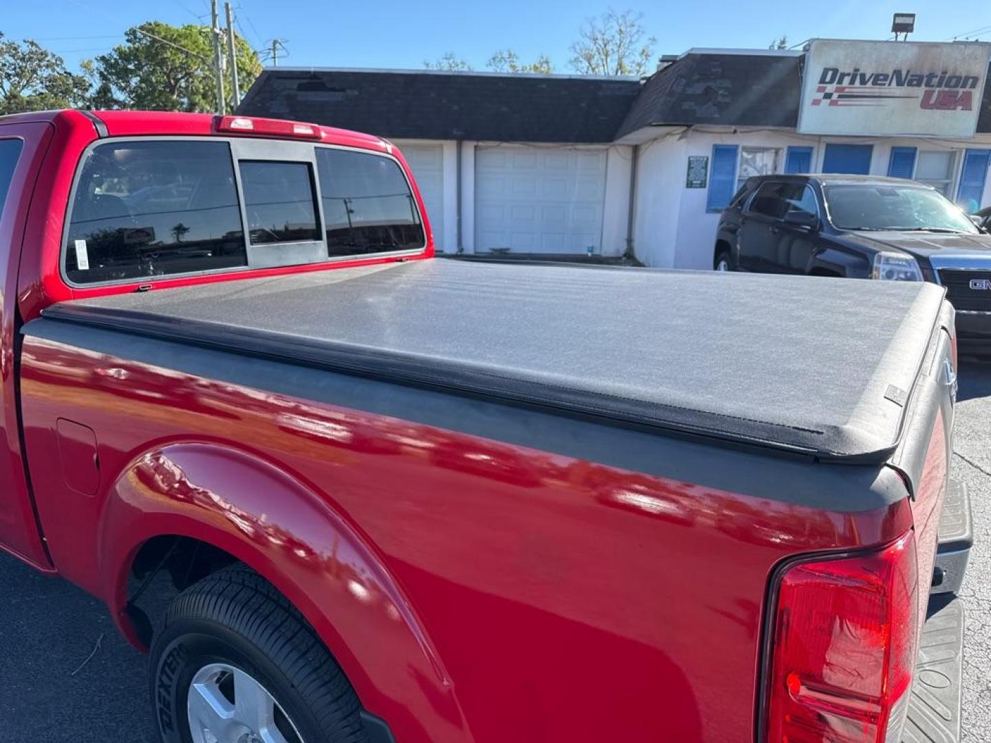 2008 RED NISSAN FRONTIER KING CAB LE (1N6AD06U98C) with an 4.0L engine, Automatic transmission, located at 2929 9th St. West, Bradenton, 34205, (941) 242-2810, 27.473591, -82.570679 - Thanks for inquring into DriveNation USA! All vehicles listed can be viewed at www.drivenationusa.com for vehicle history reports and additonal info. We cannot quote any terms such as down payments or monthly payments without an application. You can apply directly at www.drivenationusa.com or by con - Photo#11
