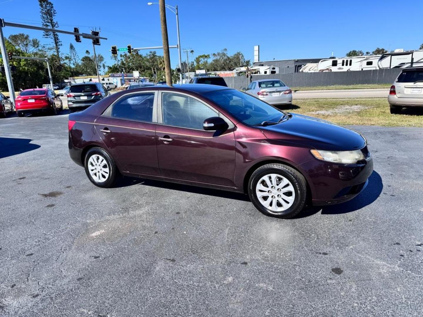 2010 PURPLE KIA FORTE EX (KNAFU4A28A5) with an 2.0L engine, Automatic transmission, located at 2929 9th St. West, Bradenton, 34205, (941) 242-2810, 27.473591, -82.570679 - Photo#0