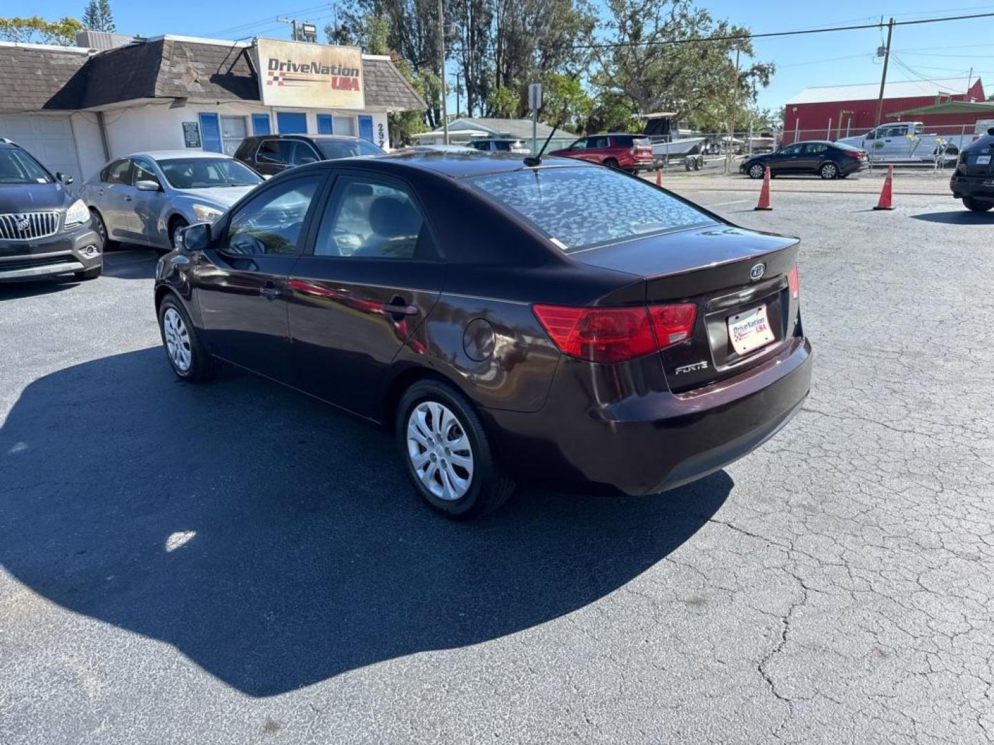 2010 PURPLE KIA FORTE EX (KNAFU4A28A5) with an 2.0L engine, Automatic transmission, located at 2929 9th St. West, Bradenton, 34205, (941) 242-2810, 27.473591, -82.570679 - Photo#5