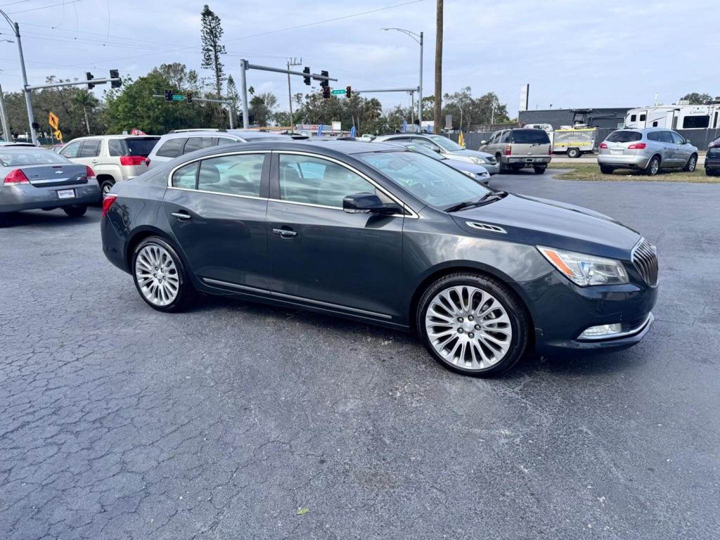 2014 BLACK BUICK LACROSSE TOURING (1G4GF5G34EF) with an 3.6L engine, Automatic transmission, located at 2929 9th St. West, Bradenton, 34205, (941) 242-2810, 27.473591, -82.570679 - Thanks for inquring into DriveNation USA! All vehicles listed can be viewed at www.drivenationusa.com for vehicle history reports and additonal info. We cannot quote any terms such as down payments or monthly payments without an application. You can apply directly at www.drivenationusa.com or by con - Photo#2