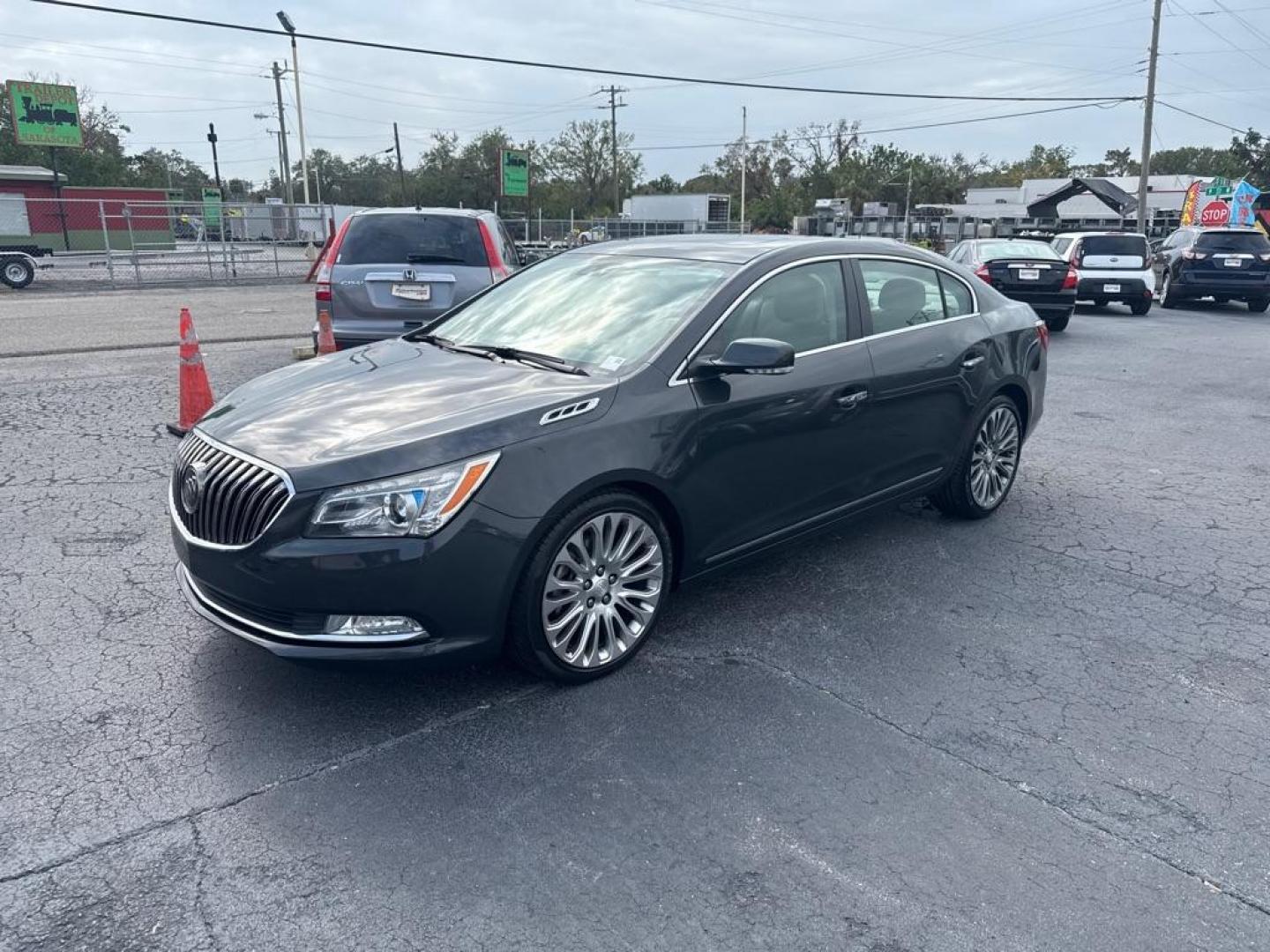 2014 BLACK BUICK LACROSSE TOURING (1G4GF5G34EF) with an 3.6L engine, Automatic transmission, located at 2929 9th St. West, Bradenton, 34205, (941) 242-2810, 27.473591, -82.570679 - Thanks for inquring into DriveNation USA! All vehicles listed can be viewed at www.drivenationusa.com for vehicle history reports and additonal info. We cannot quote any terms such as down payments or monthly payments without an application. You can apply directly at www.drivenationusa.com or by con - Photo#3