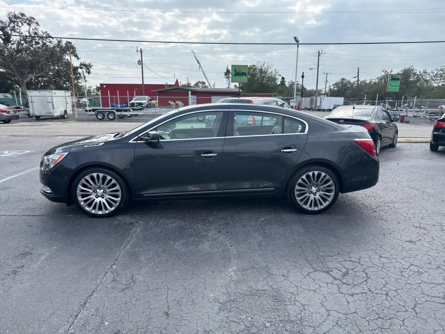 2014 BLACK BUICK LACROSSE TOURING (1G4GF5G34EF) with an 3.6L engine, Automatic transmission, located at 2929 9th St. West, Bradenton, 34205, (941) 242-2810, 27.473591, -82.570679 - Thanks for inquring into DriveNation USA! All vehicles listed can be viewed at www.drivenationusa.com for vehicle history reports and additonal info. We cannot quote any terms such as down payments or monthly payments without an application. You can apply directly at www.drivenationusa.com or by con - Photo#4