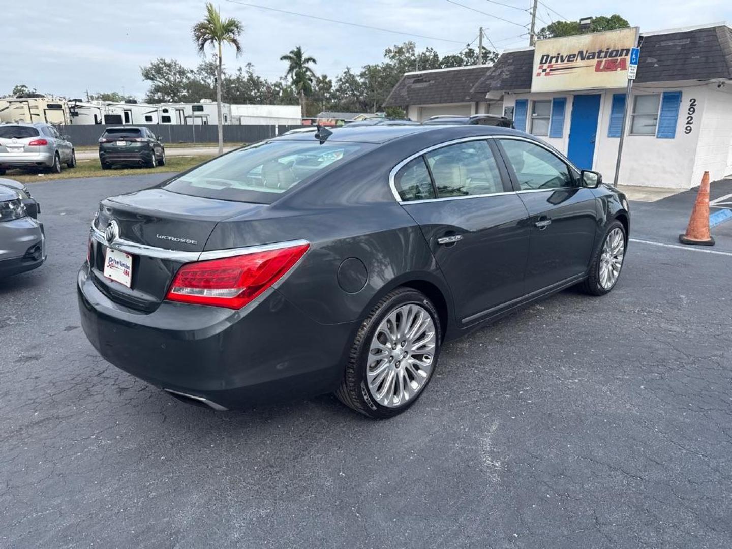 2014 BLACK BUICK LACROSSE TOURING (1G4GF5G34EF) with an 3.6L engine, Automatic transmission, located at 2929 9th St. West, Bradenton, 34205, (941) 242-2810, 27.473591, -82.570679 - Thanks for inquring into DriveNation USA! All vehicles listed can be viewed at www.drivenationusa.com for vehicle history reports and additonal info. We cannot quote any terms such as down payments or monthly payments without an application. You can apply directly at www.drivenationusa.com or by con - Photo#6