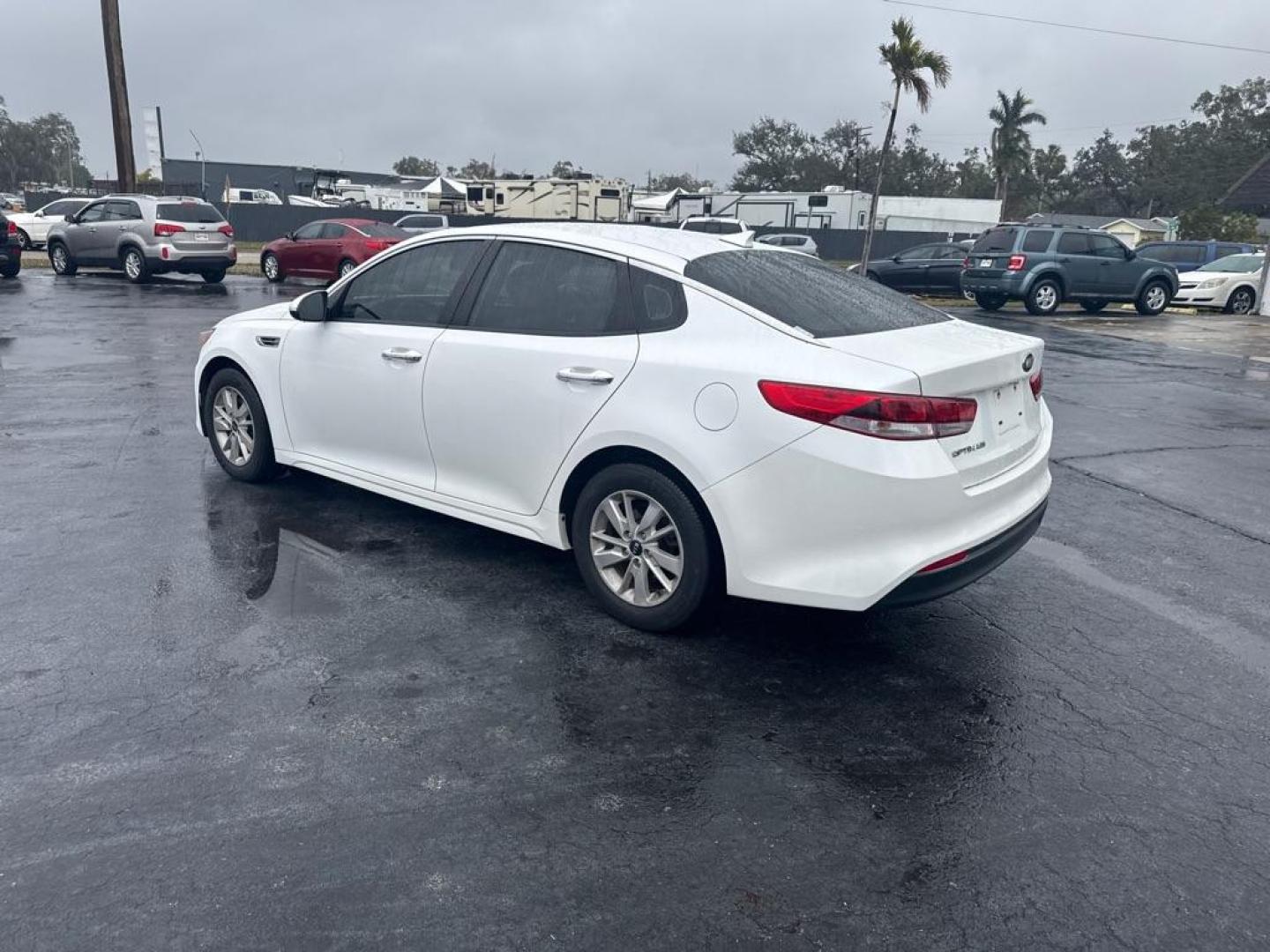 2016 WHITE KIA OPTIMA LX (KNAGT4L30G5) with an 2.4L engine, Automatic transmission, located at 2929 9th St. West, Bradenton, 34205, (941) 242-2810, 27.473591, -82.570679 - Thanks for inquring into DriveNation USA! All vehicles listed can be viewed at www.drivenationusa.com for vehicle history reports and additonal info. We cannot quote any terms such as down payments or monthly payments without an application. You can apply directly at www.drivenationusa.com or by con - Photo#6