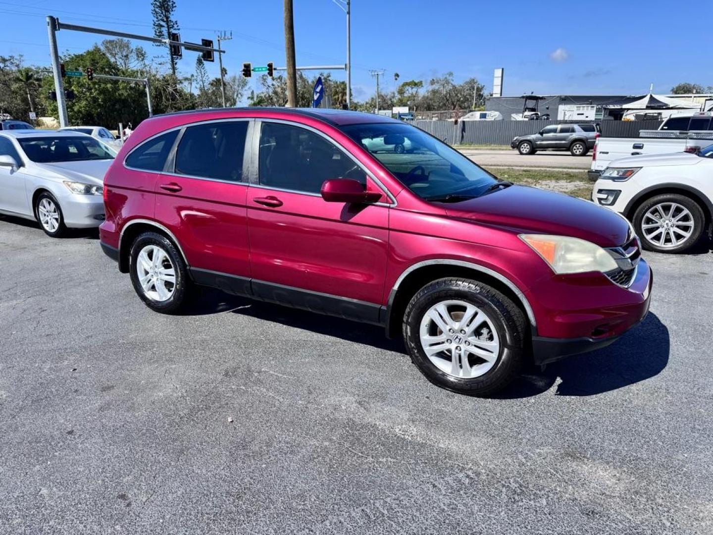 2011 RED HONDA CR-V EXL (5J6RE3H75BL) with an 2.4L engine, Automatic transmission, located at 2929 9th St. West, Bradenton, 34205, (941) 242-2810, 27.473591, -82.570679 - Photo#1